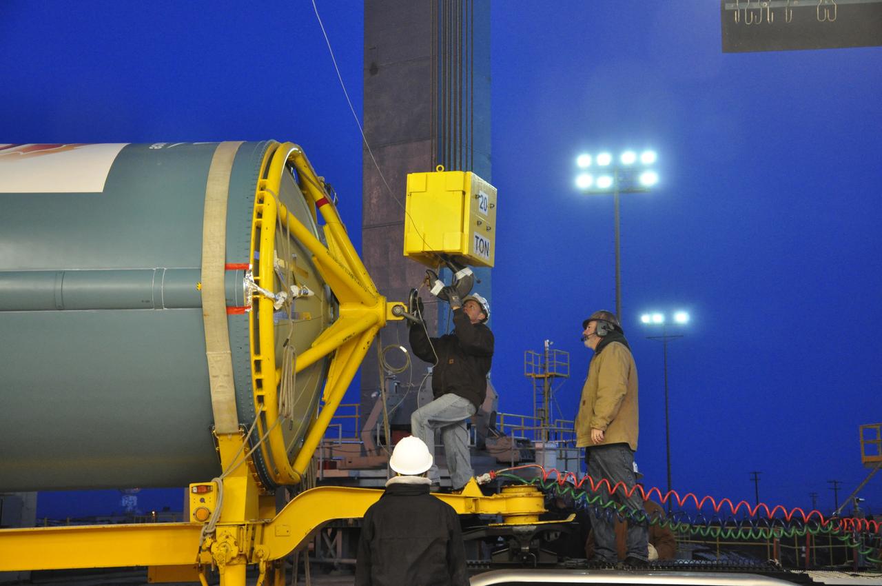 VANDENBERG AIR FORCE BASE, Calif. – Workers attach the United Launch Alliance Delta II rocket for NASA's Orbiting Carbon Observatory-2 mission, or OCO-2, to a lifting device at Space Launch Complex 2 on Vandenberg Air Force Base in California. Launch is scheduled for July 2014. The observatory will collect precise global measurements of carbon dioxide in the Earth's atmosphere and provide scientists with a better idea of the chemical compound's impacts on climate change. Scientists will analyze this data to improve our understanding of the natural processes and human activities that regulate the abundance and distribution of this important atmospheric gas. To learn more about OCO-2, visit http://oco.jpl.nasa.gov. Photo credit: NASA/Randy Beaudoin