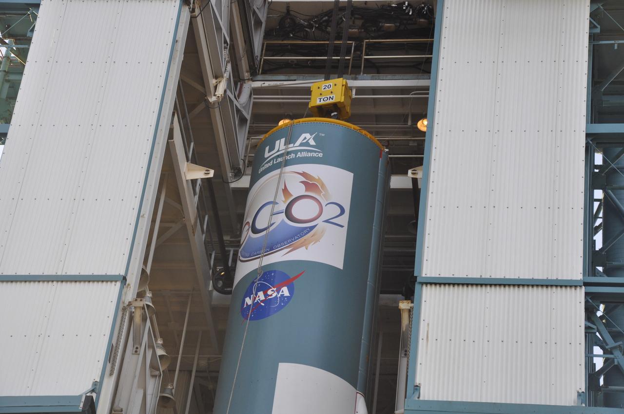 VANDENBERG AIR FORCE BASE, Calif. – The United Launch Alliance Delta II rocket for NASA's Orbiting Carbon Observatory-2 mission, or OCO-2, is transferred into the mobile service tower at Space Launch Complex 2 on Vandenberg Air Force Base in California. Launch is scheduled for July 2014. The observatory will collect precise global measurements of carbon dioxide in the Earth's atmosphere and provide scientists with a better idea of the chemical compound's impacts on climate change. Scientists will analyze this data to improve our understanding of the natural processes and human activities that regulate the abundance and distribution of this important atmospheric gas. To learn more about OCO-2, visit http://oco.jpl.nasa.gov. Photo credit: NASA/Randy Beaudoin
