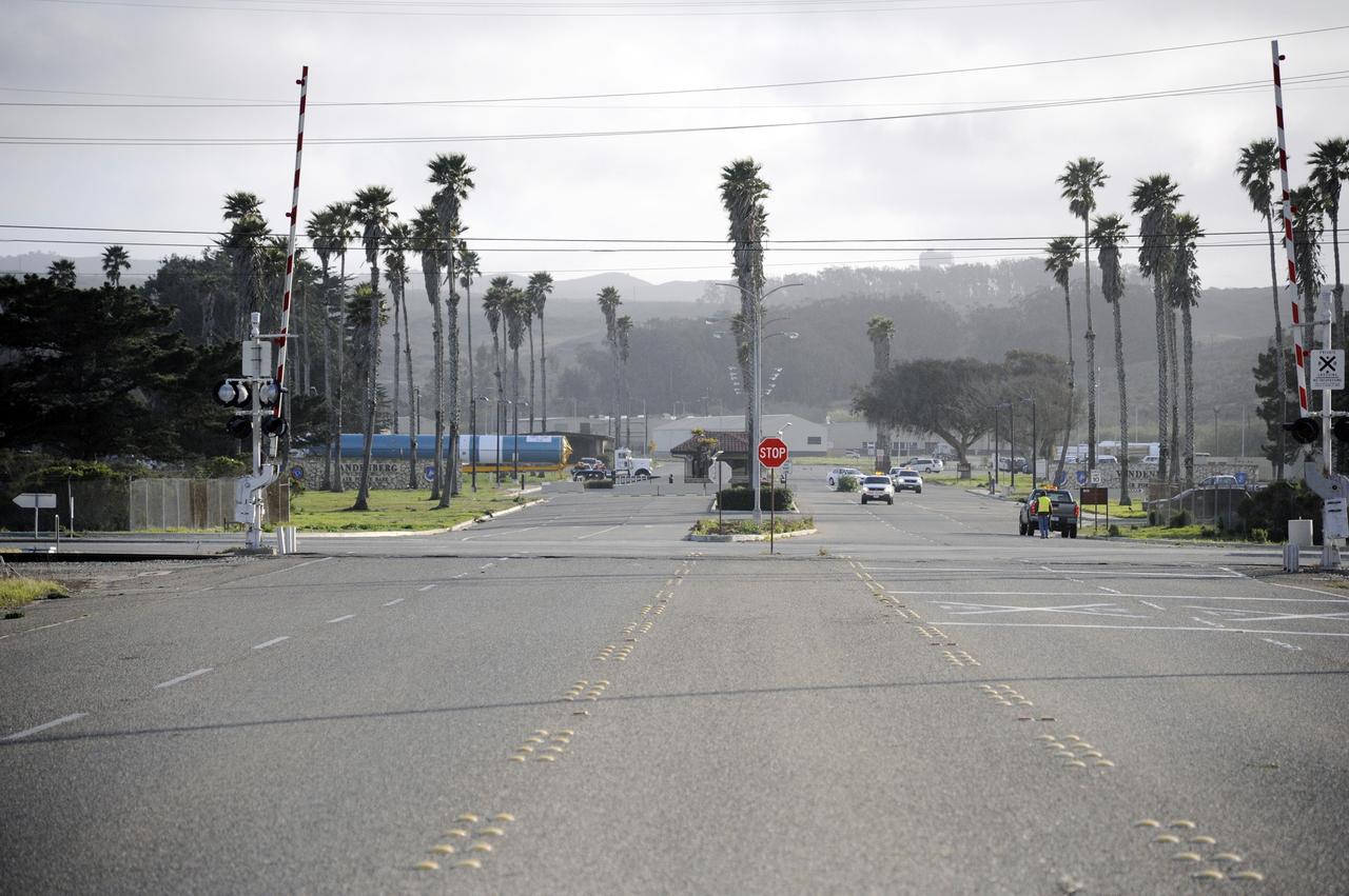 VANDENBERG AIR FORCE BASE, Calif. – The Delta first-stage booster for NASA's Orbiting Carbon Observatory-2 mission, or OCO-2, noses its way into the traffic on the roads at Vandenberg Air Force Base in California on its move from the Building 836 hangar to the Horizontal Processing Facility at Space Launch Complex 2.    OCO-2 is scheduled to launch aboard a United Launch Alliance Delta II rocket on July 1, 2014.  The observatory will collect precise global measurements of carbon dioxide in the Earth's atmosphere and provide scientists with a better idea of the chemical compound's impacts on climate change. Scientists will analyze this data to improve our understanding of the natural processes and human activities that regulate the abundance and distribution of this important atmospheric gas. To learn more about OCO-2, visit http://oco.jpl.nasa.gov.  Photo credit: NASA/D. Liberotti, 30th Space Wing, VAFB