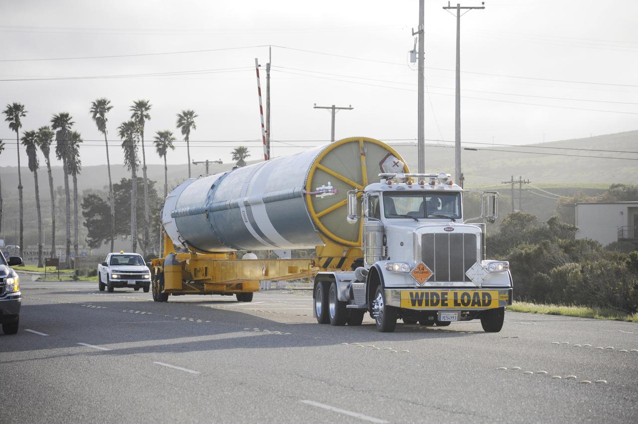 VANDENBERG AIR FORCE BASE, Calif. – The Delta first-stage booster for NASA's Orbiting Carbon Observatory-2 mission, or OCO-2, makes its way along the roads at Vandenberg Air Force Base in California on its move from the Building 836 hangar to the Horizontal Processing Facility at Space Launch Complex 2.    OCO-2 is scheduled to launch aboard a United Launch Alliance Delta II rocket on July 1, 2014.  The observatory will collect precise global measurements of carbon dioxide in the Earth's atmosphere and provide scientists with a better idea of the chemical compound's impacts on climate change. Scientists will analyze this data to improve our understanding of the natural processes and human activities that regulate the abundance and distribution of this important atmospheric gas. To learn more about OCO-2, visit http://oco.jpl.nasa.gov.  Photo credit: NASA/D. Liberotti, 30th Space Wing, VAFB
