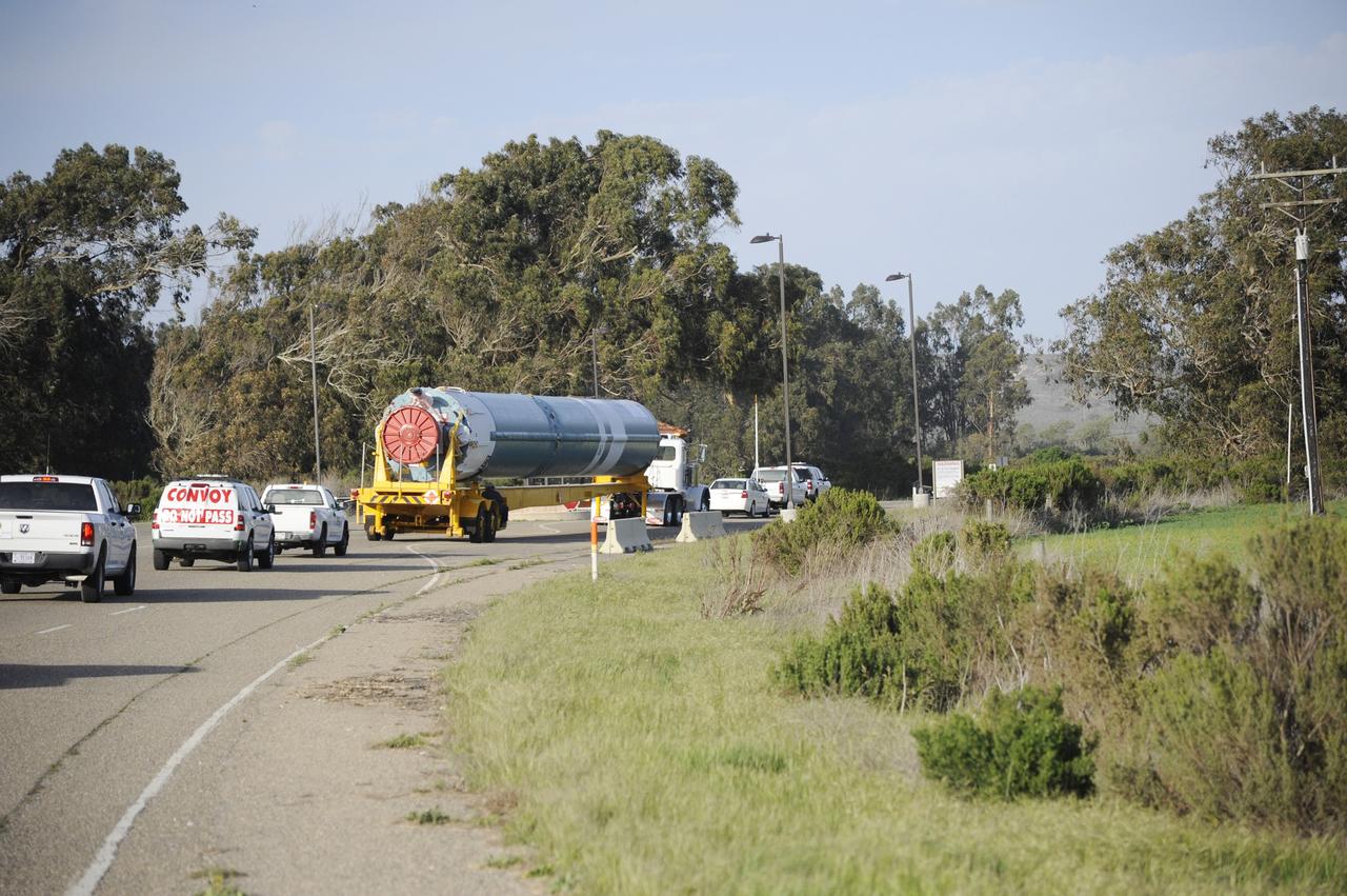 VANDENBERG AIR FORCE BASE, Calif. – The Delta first-stage booster for NASA's Orbiting Carbon Observatory-2 mission, or OCO-2, winds its way along the roads at Vandenberg Air Force Base in California on its move from the Building 836 hangar to the Horizontal Processing Facility at Space Launch Complex 2.    OCO-2 is scheduled to launch aboard a United Launch Alliance Delta II rocket on July 1, 2014.  The observatory will collect precise global measurements of carbon dioxide in the Earth's atmosphere and provide scientists with a better idea of the chemical compound's impacts on climate change. Scientists will analyze this data to improve our understanding of the natural processes and human activities that regulate the abundance and distribution of this important atmospheric gas. To learn more about OCO-2, visit http://oco.jpl.nasa.gov.  Photo credit: NASA/D. Liberotti, 30th Space Wing, VAFB