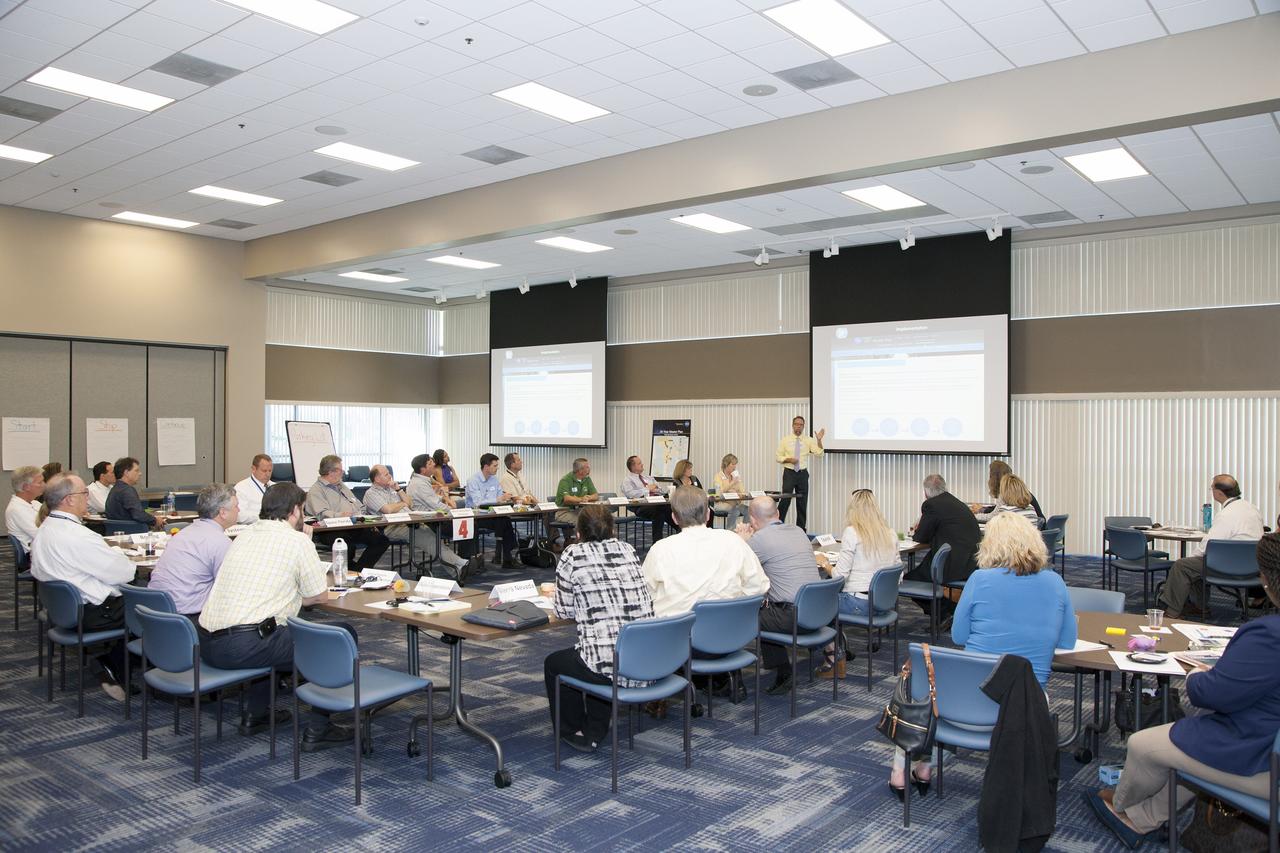 CAPE CANAVERAL, Fla. -- At the Kennedy Space Center in Florida, Trey Carlson, the spaceport's master planner, describes how the Center Planning and Development Directorate CPD is working to help transform Kennedy into a multi-user spaceport through partnerships and resource planning. The event was first of what is planned to be quarterly meetings between NASA's industry partners and representatives of Kennedy's CPD, Safety and Mission Assurance, International Space Station Ground Processing, Chief Financial officer and Ground Processing and Ground Systems Development and Operations directorates. Center Planning and Development is the “front door” for partnerships with NASA’s Kennedy Space Center. Kennedy is now developing the world’s premier spaceport for government and commercial space industries using comprehensive resource planning and partnerships. Photo credit: NASA/Daniel Casper