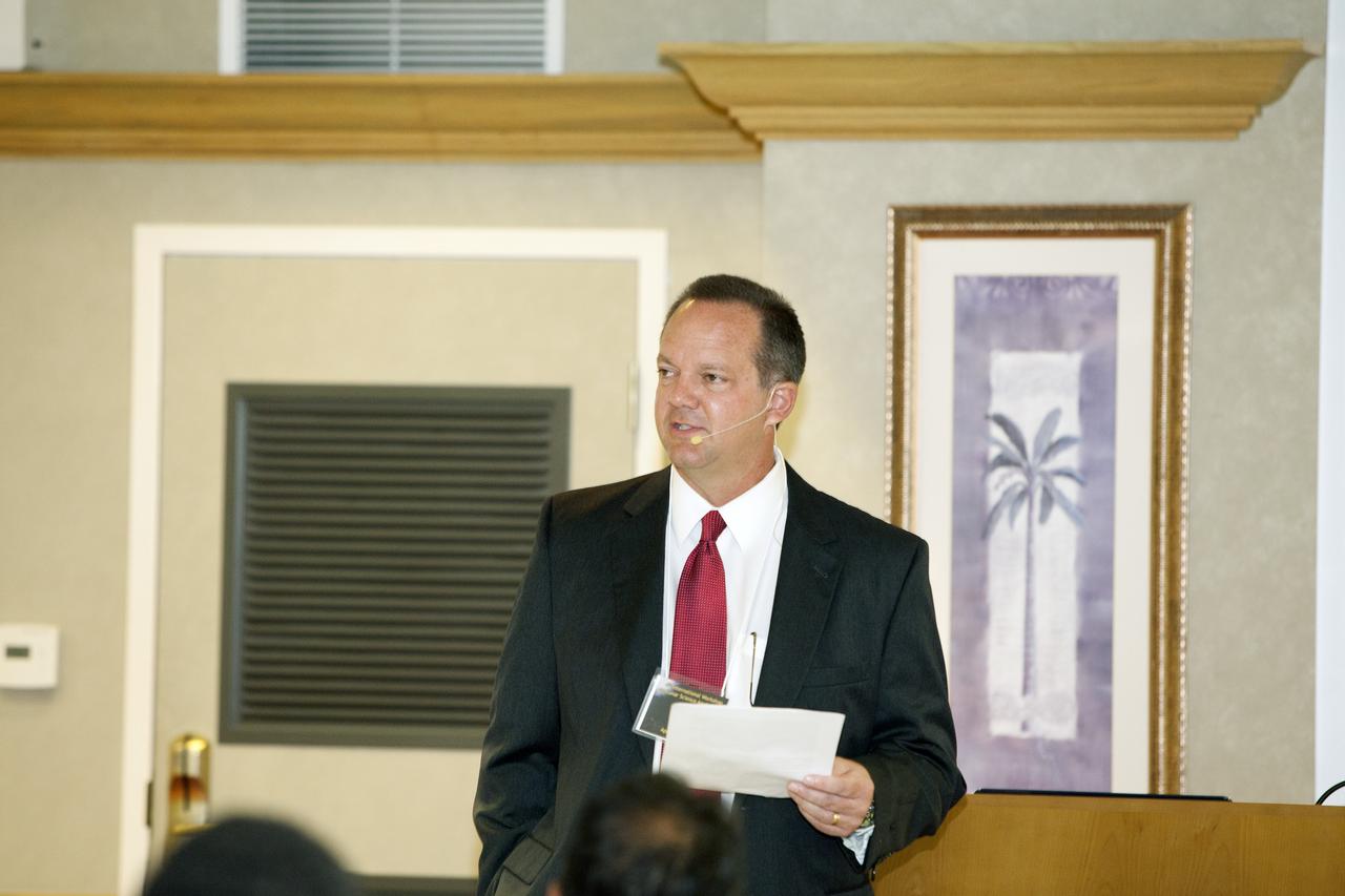 CAPE CANAVERAL, Fla. -- At the Marriott Courtyard Hotel in Cocoa Beach, Fla., Tom Engler, deputy director of Center Planning and Development at NASA's Kennedy Space Center, speaks to participants in the 4th International Workshop on Lunar and Planetary Compact and Cryogenic Science and Technology Applications.      Scientists, engineers and entrepreneurs interested in research on the moon and other planetary surfaces, recently participated in the Workshop. Taking place April 8-11, 2014, the event was designed to foster collaborative work among those interested in solving the challenges of building hardware, software and businesses interested in going back to the moon and exploring beyond. Photo credit: NASA/Daniel Casper