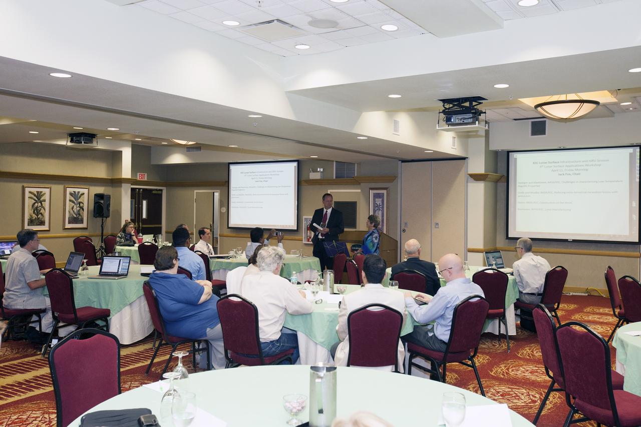 CAPE CANAVERAL, Fla. -- At the Marriott Courtyard Hotel in Cocoa Beach, Fla., Tom Engler, deputy director of Center Planning and Development at NASA's Kennedy Space Center, speaks to participants in the 4th International Workshop on Lunar and Planetary Compact and Cryogenic Science and Technology Applications.      Scientists, engineers and entrepreneurs interested in research on the moon and other planetary surfaces, recently participated in the Workshop. Taking place April 8-11, 2014, the event was designed to foster collaborative work among those interested in solving the challenges of building hardware, software and businesses interested in going back to the moon and exploring beyond. Photo credit: NASA/Daniel Casper