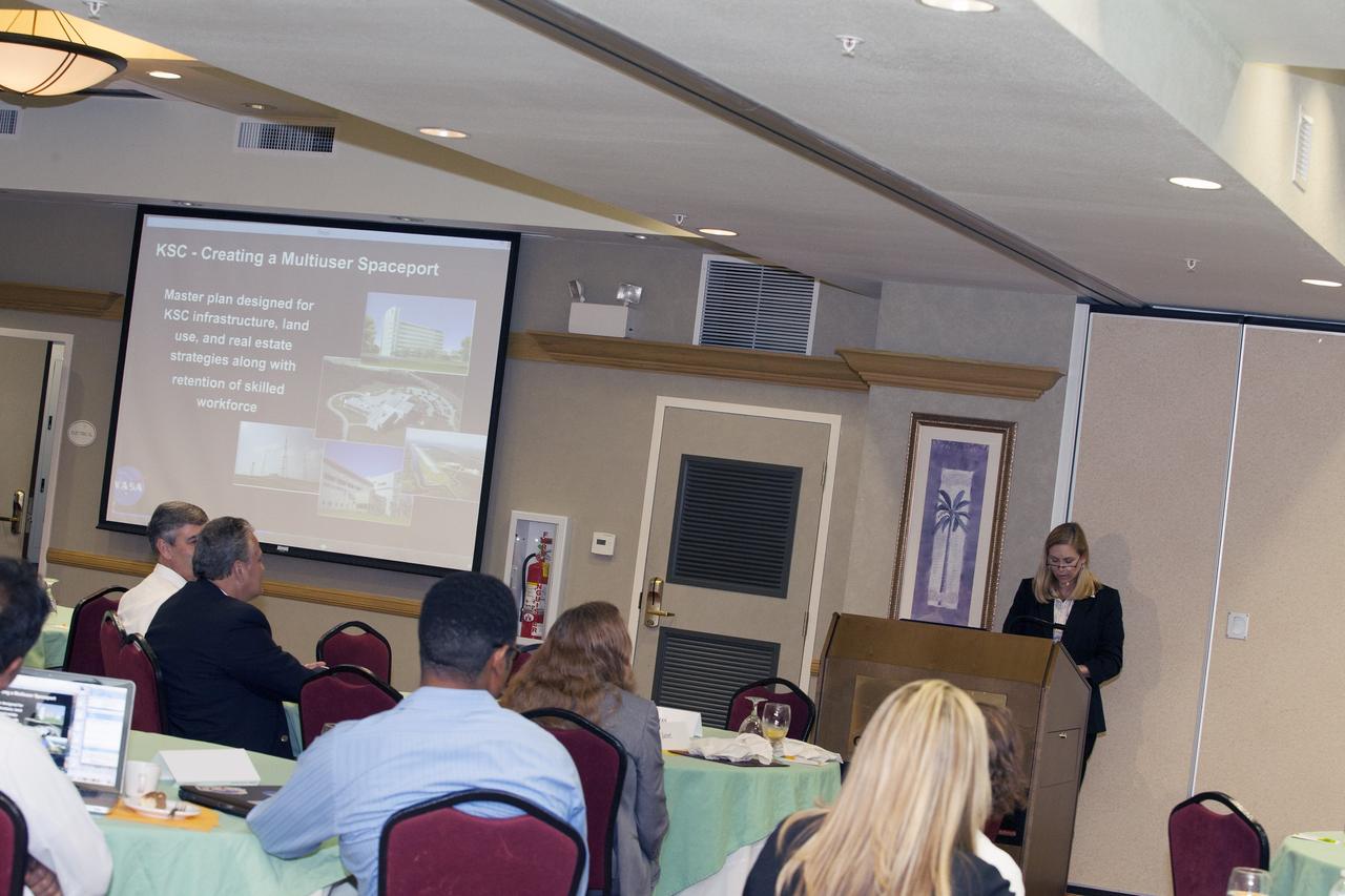 CAPE CANAVERAL, Fla. -- At the Marriott Courtyard Hotel in Cocoa Beach, Fla., Janet Petro, deputy director of NASA's Kennedy Space Center, speaks to participants in the 4th International Workshop on Lunar and Planetary Compact and Cryogenic Science and Technology Applications.    Scientists, engineers and entrepreneurs interested in research on the moon and other planetary surfaces, recently participated in the Workshop. Taking place April 8-11, 2014, the event was designed to foster collaborative work among those interested in solving the challenges of building hardware, software and businesses interested in going back to the moon and exploring beyond. Photo credit: NASA/Daniel Casper