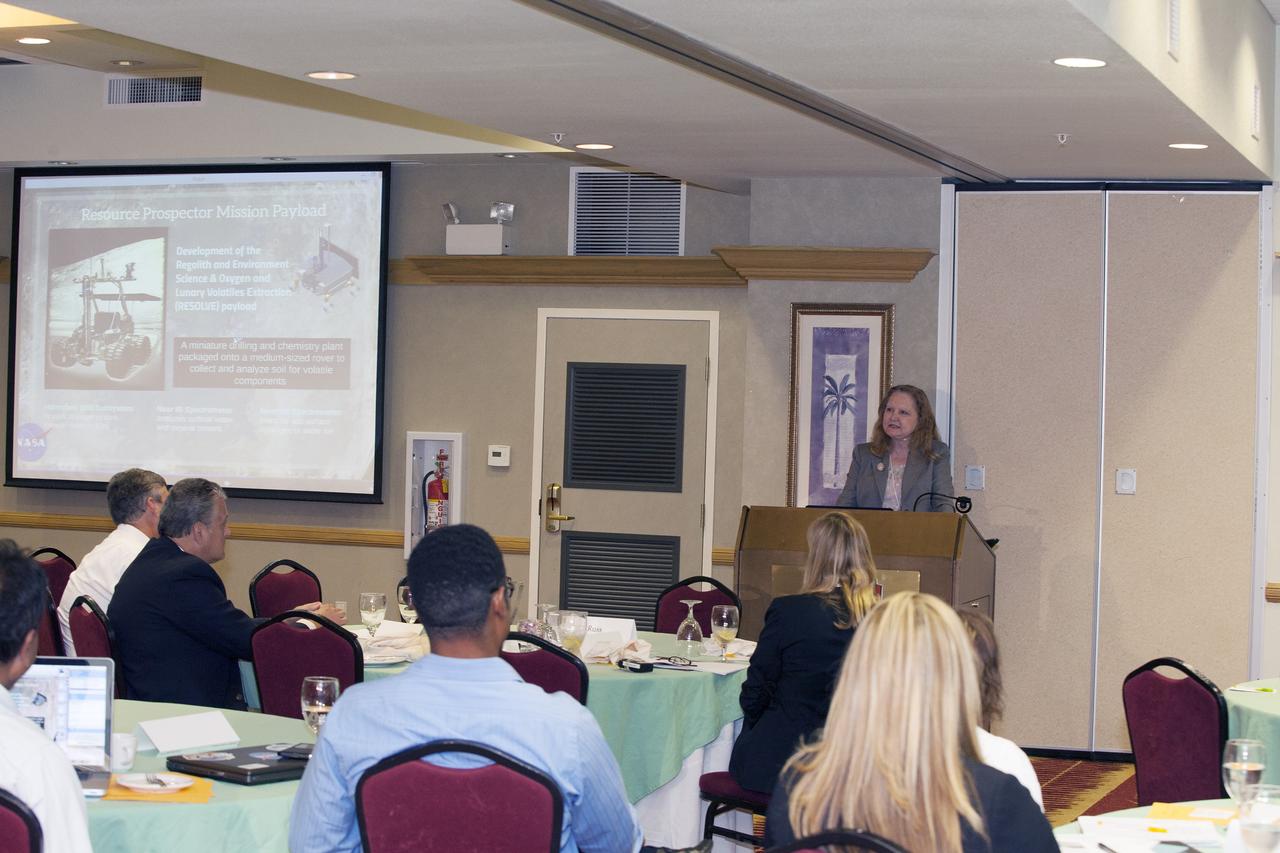CAPE CANAVERAL, Fla. -- At the Marriott Courtyard Hotel in Cocoa Beach, Fla., Karen Thompson, NASA's chief technologist at the Kennedy Space Center, speaks to participants in the 4th International Workshop on Lunar and Planetary Compact and Cryogenic Science and Technology Applications.    Scientists, engineers and entrepreneurs interested in research on the moon and other planetary surfaces, recently participated in the Workshop. Taking place April 8-11, 2014, the event was designed to foster collaborative work among those interested in solving the challenges of building hardware, software and businesses interested in going back to the moon and exploring beyond. Photo credit: NASA/Daniel Casper