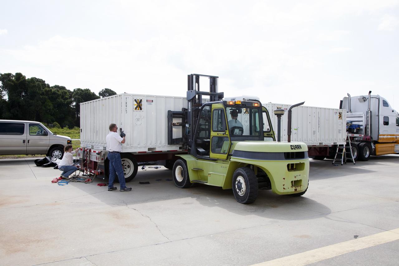 CAPE CANAVERAL, Fla. - The first set of Ogive panels for the Orion Launch Abort System arrives by truck at the Launch Abort System Facility at NASA’s Kennedy Space Center in Florida. During processing, the Ogive panels will enclose and protect the Orion spacecraft and attach to the Launch Abort System. Orion is the exploration spacecraft designed to carry astronauts to destinations not yet explored by humans, including an asteroid and Mars. It will have emergency abort capability, sustain the crew during space travel and provide safe re-entry from deep space return velocities. The first unpiloted test flight of Orion is scheduled to launch in 2014 atop a Delta IV rocket and in 2017 on NASA’s Space Launch System rocket. For more information, visit www.nasa.gov/orion. Photo credit: Daniel Casper