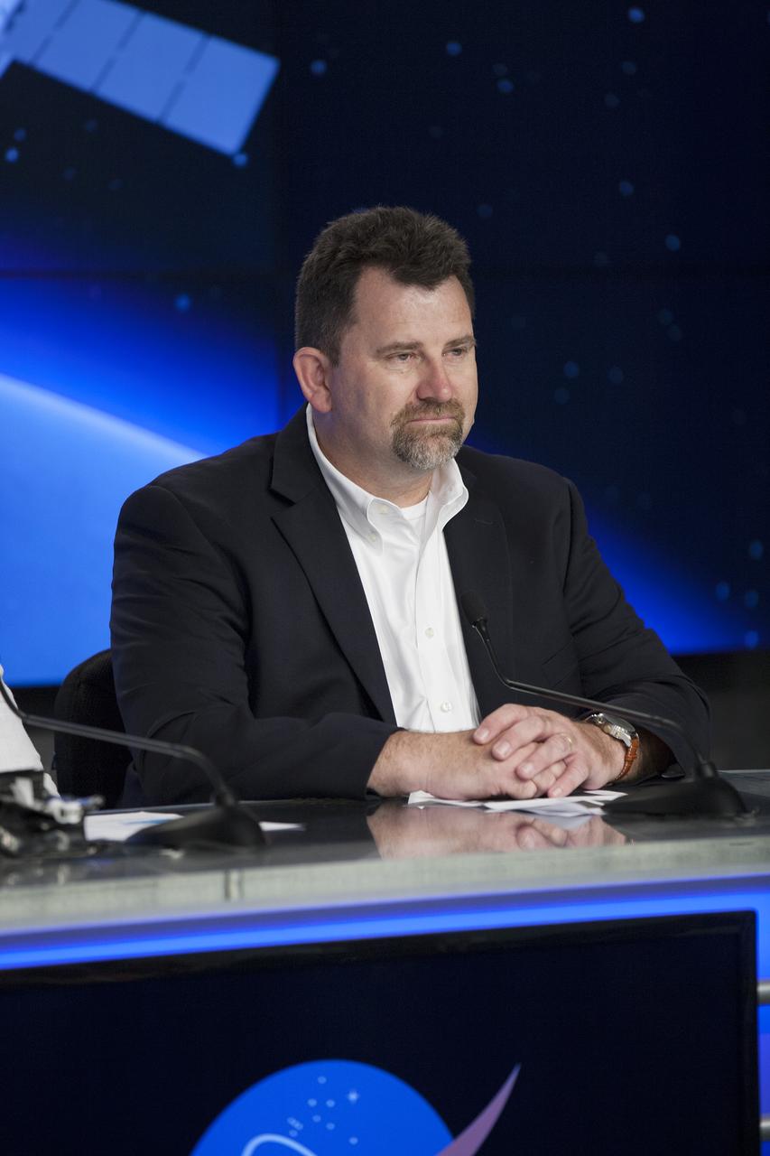 CAPE CANAVERAL, Fla. – During a news conference at NASA's Kennedy Space Center in Florida, agency and contractor officials discussed science and technology experiment payloads being transported to the International Space Station by the SpaceX-3 Commercial Resupply Services mission. Participating in the briefing is Michael Roberts, senior research pathway manager with the Center for the Advancement of Science in Space CASIS.      Scheduled for launch on April 14, 2014 atop a Falcon 9 rocket, the Dragon spacecraft will be marking its fourth trip to the space station. The SpaceX-3 mission carrying almost 2.5 tons of supplies, technology and science experiments is the third of 12 flights contracted by NASA to resupply the orbiting laboratory. For more information, visit http://www.nasa.gov/mission_pages/station/structure/launch/index.html Photo credit: NASA/ Kim Shiflett