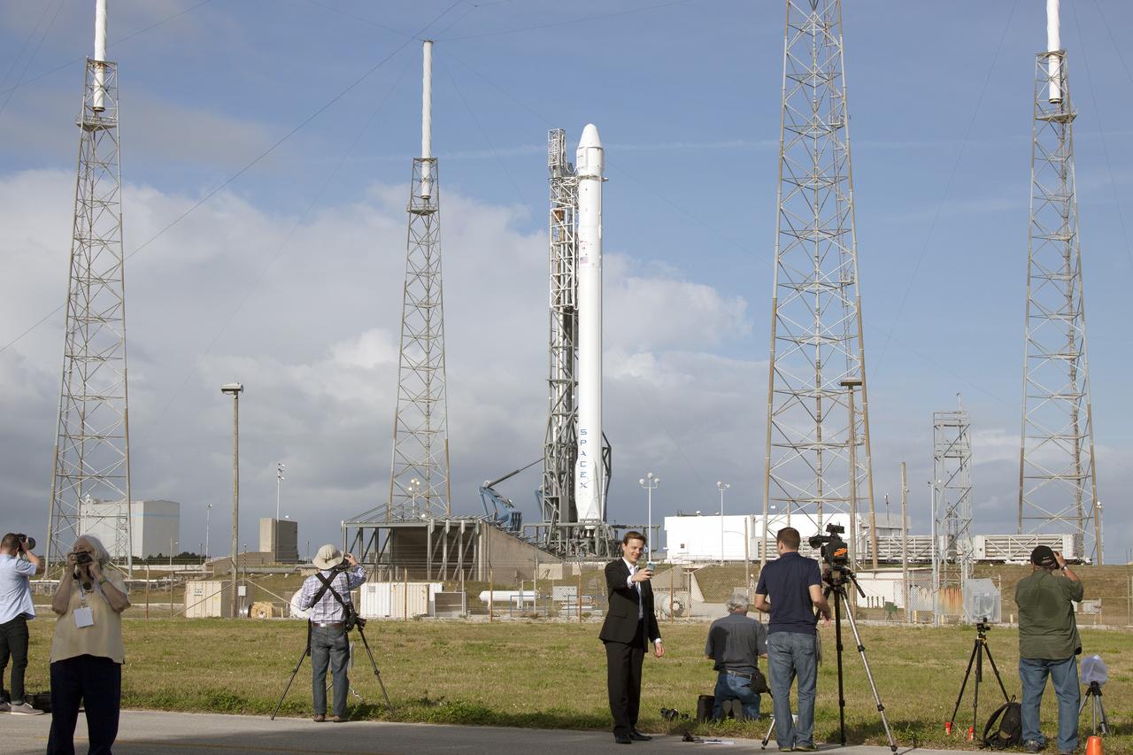 CAPE CANAVERAL, Fla. - Social media representatives photograph the SpaceX Falcon 9 rocket and Dragon Capsule on Space Launch Complex 40 on Cape Canaveral Air Force Station in Florida. NASA Social participants are given the same access as news media in an effort to align the experience of social media representatives with those of traditional media, including the opportunity to view a launch of SpaceX’s Falcon 9 rocket, tour NASA facilities at Kennedy Space Center, speak with representatives from both NASA and SpaceX, view and take photographs of the SpaceX launch pad, meet fellow space enthusiasts who are active on social media and meet members of SpaceX and NASA's social media teams.      Scheduled for launch at about 4:58 p.m. EDT April 14, Dragon will be making its fourth trip to the space station. The SpaceX-3 mission, carrying almost 2.5 tons of supplies, technology and science experiments, is the third of 12 flights under NASA's Commercial Resupply Services contract to resupply the orbiting laboratory. For more information, visit http://www.nasa.gov/mission_pages/station/structure/launch/index.html Photo credit: NASA/Glenn Benson
