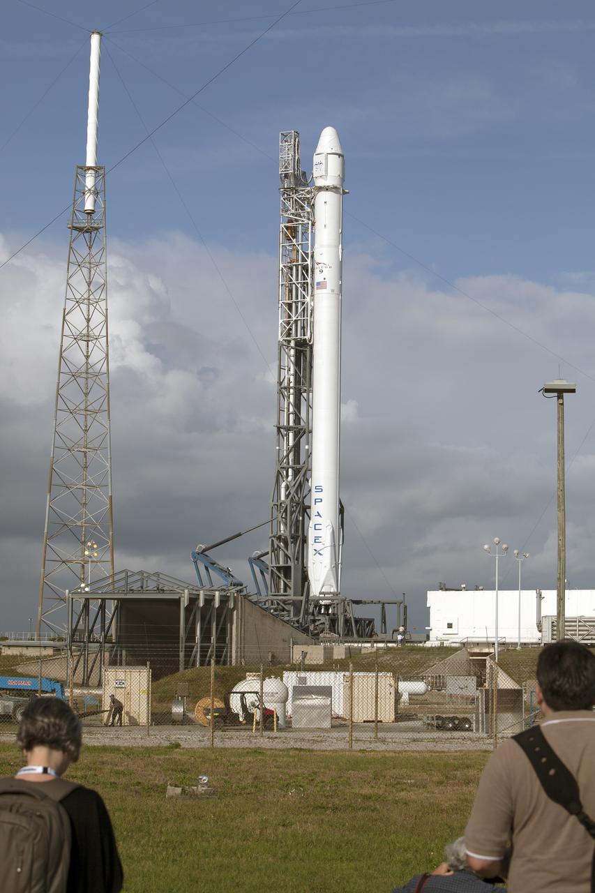 CAPE CANAVERAL, Fla. - Social media representatives get an up-close view of the SpaceX Falcon 9 rocket and Dragon Capsule on Space Launch Complex 40 on Cape Canaveral Air Force Station in Florida. NASA Social participants are given the same access as news media in an effort to align the experience of social media representatives with those of traditional media, including the opportunity to view a launch of SpaceX’s Falcon 9 rocket, tour NASA facilities at Kennedy Space Center, speak with representatives from both NASA and SpaceX, view and take photographs of the SpaceX launch pad, meet fellow space enthusiasts who are active on social media and meet members of SpaceX and NASA's social media teams.      Scheduled for launch at about 4:58 p.m. EDT April 14, Dragon will be making its fourth trip to the space station. The SpaceX-3 mission, carrying almost 2.5 tons of supplies, technology and science experiments, is the third of 12 flights under NASA's Commercial Resupply Services contract to resupply the orbiting laboratory. For more information, visit http://www.nasa.gov/mission_pages/station/structure/launch/index.html Photo credit: NASA/Glenn Benson