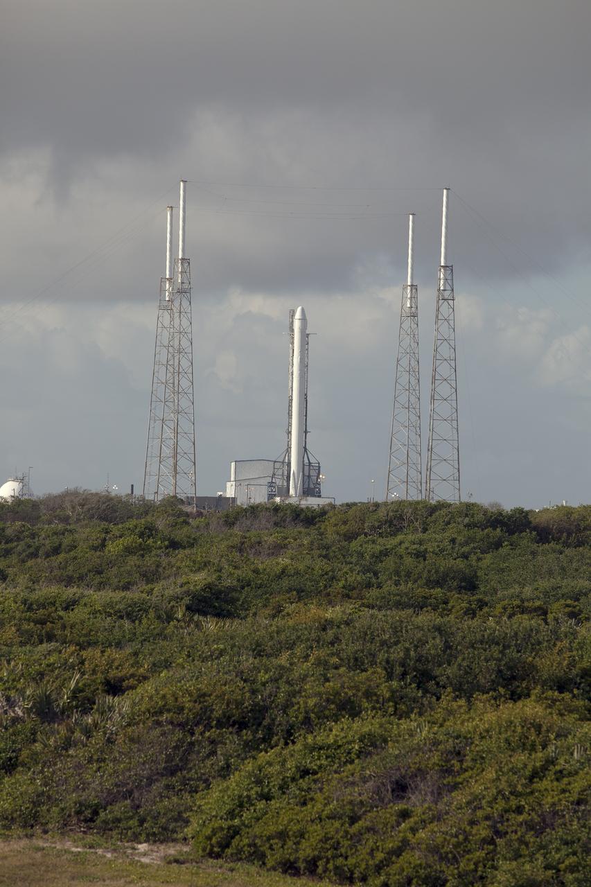 CAPE CANAVERAL, Fla. - Clouds fill the sky over Space Launch Complex 40 on Cape Canaveral Air Force Station in Florida on launch day for a SpaceX Falcon 9 rocket and a Dragon capsule on its third commercial resupply mission to deliver about 5,000 pounds of cargo to the International Space Station.    Scheduled for launch at about 4:58 p.m. EDT April 14, Dragon will be making its fourth trip to the space station. The SpaceX-3 mission, carrying almost 2.5 tons of supplies, technology and science experiments, is the third of 12 flights under NASA's Commercial Resupply Services contract to resupply the orbiting laboratory. For more information, visit http://www.nasa.gov/mission_pages/station/structure/launch/index.html Photo credit: NASA/Glenn Benson