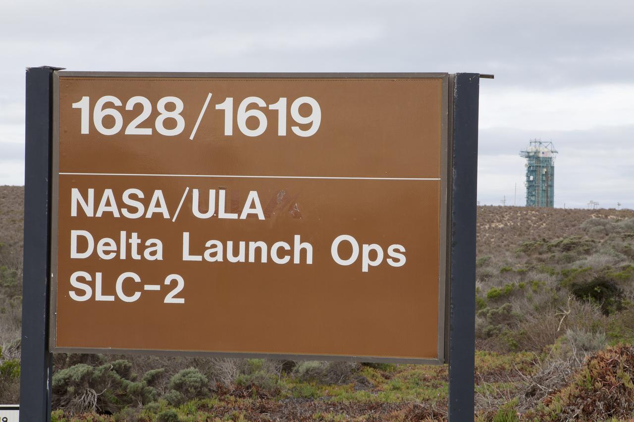 VANDENBERG AIR FORCE BASE, Calif. – A sign on Vandenberg Air Force Base in California identifies the steel structure in the background as Space Launch Complex 2, or SLC-2, where preparations are underway for the upcoming launch of NASA's Orbiting Carbon Observatory-2 mission, or OCO-2, aboard a United Launch Alliance Delta II rocket in July.    The observatory will collect precise global measurements of carbon dioxide in the Earth's atmosphere and provide scientists with a better idea of the chemical compound's impacts on climate change. Scientists will analyze this data to improve our understanding of the natural processes and human activities that regulate the abundance and distribution of this important atmospheric gas. To learn more about OCO-2, visit http://oco.jpl.nasa.gov.  Photo credit: NASA/Kim Shiflett