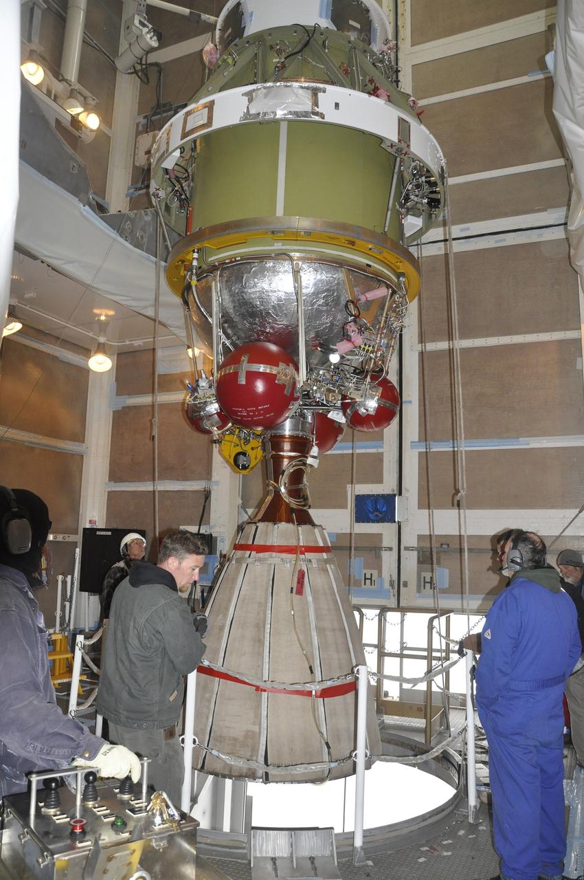 VANDENBERG AIR FORCE BASE, Calif. – Workers monitor the Delta II second stage for NASA's Orbiting Carbon Observatory-2 mission, or OCO-2, as it is lifted into position for mating with the rocket's first stage in the mobile service tower at Space Launch Complex 2 on Vandenberg Air Force Base in California.     OCO-2 is scheduled to launch aboard a United Launch Alliance Delta II rocket in July. The rocket's second stage will insert OCO-2 into a polar Earth orbit.  OCO-2 will collect precise global measurements of carbon dioxide in the Earth's atmosphere and provide scientists with a better idea of the chemical compound's impacts on climate change. Scientists will analyze this data to improve our understanding of the natural processes and human activities that regulate the abundance and distribution of this important atmospheric gas. To learn more about OCO-2, visit http://oco.jpl.nasa.gov.  Photo credit: NASA/Randy Beaudoin