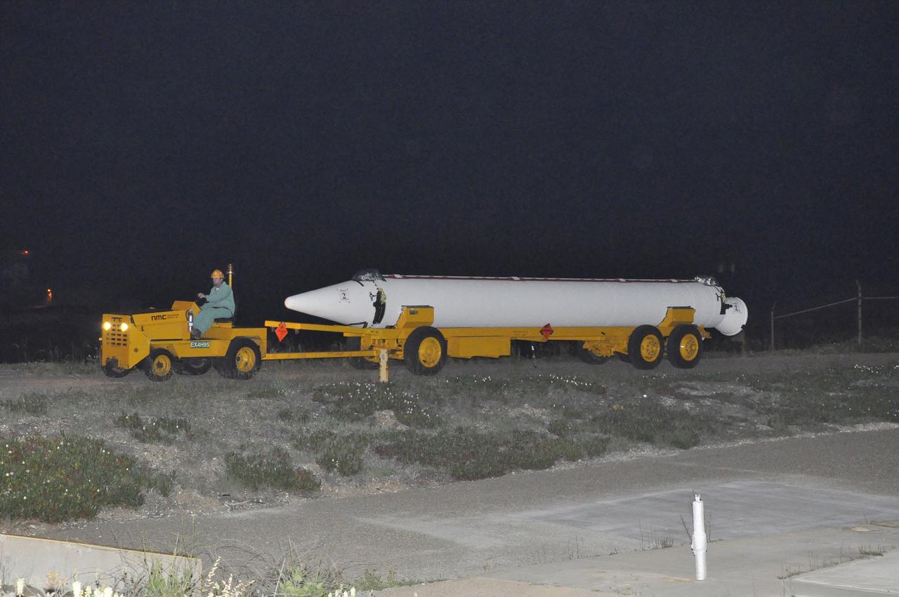 VANDENBERG AIR FORCE BASE, Calif. – A solid rocket motor, or SRM, for NASA's Orbiting Carbon Observatory-2 mission, or OCO-2, is towed to Space Launch Complex 2 on Vandenberg Air Force Base in California. Operations are underway to attach the Delta II rocket's three SRMs, known as graphite epoxy motors, to the rocket's first stage. OCO-2 is scheduled to launch into a polar Earth orbit aboard a United Launch Alliance Delta II 7320-10C rocket in July. Once in orbit, OCO-2 will collect precise global measurements of carbon dioxide in the Earth's atmosphere and provide scientists with a better idea of the chemical compound's impacts on climate change. Scientists will analyze this data to improve our understanding of the natural processes and human activities that regulate the abundance and distribution of this important atmospheric gas. To learn more about OCO-2, visit http://oco.jpl.nasa.gov. Photo credit: NASA/Randy Beaudoin