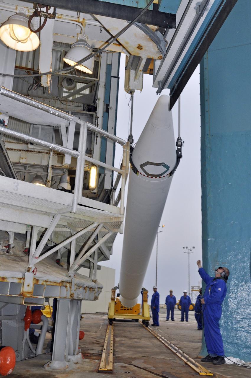 VANDENBERG AIR FORCE BASE, Calif. – A crane lifts the solid rocket motor, or SRM, for NASA's Orbiting Carbon Observatory-2 mission, or OCO-2, following its delivery to the mobile service tower at Space Launch Complex 2 on Vandenberg Air Force Base in California. Operations are underway to attach the Delta II rocket's three SRMs, known as graphite epoxy motors, to the rocket's first stage. OCO-2 is scheduled to launch into a polar Earth orbit aboard a United Launch Alliance Delta II 7320-10C rocket in July. Once in orbit, OCO-2 will collect precise global measurements of carbon dioxide in the Earth's atmosphere and provide scientists with a better idea of the chemical compound's impacts on climate change. Scientists will analyze this data to improve our understanding of the natural processes and human activities that regulate the abundance and distribution of this important atmospheric gas. To learn more about OCO-2, visit http://oco.jpl.nasa.gov. Photo credit: NASA/Randy Beaudoin