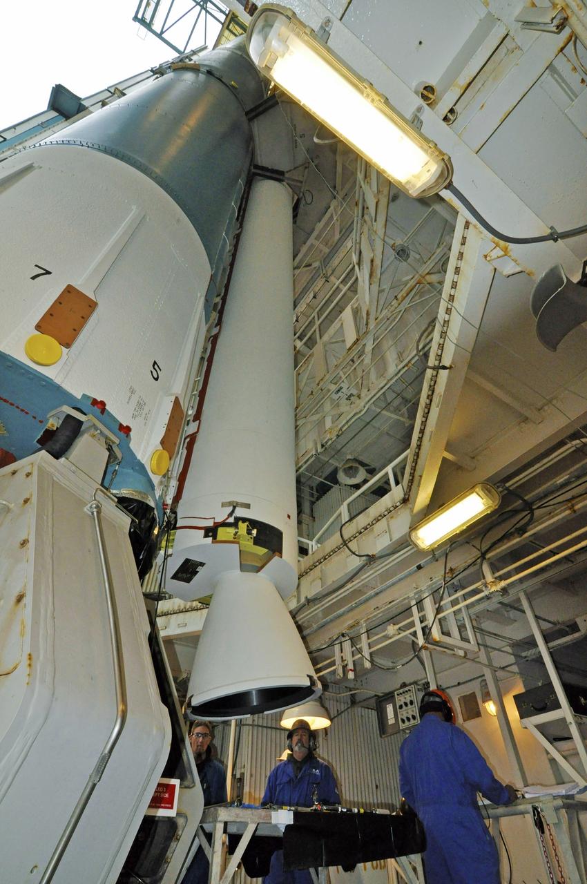 VANDENBERG AIR FORCE BASE, Calif. – The first solid rocket motor, or SRM, for NASA's Orbiting Carbon Observatory-2 mission, or OCO-2, has been attached to the Delta II first stage in the mobile service tower at Space Launch Complex 2 on Vandenberg Air Force Base in California. Operations are underway to attach the rocket's three SRMs, known as graphite epoxy motors, to its first stage.      OCO-2 is scheduled to launch into a polar Earth orbit aboard a United Launch Alliance Delta II 7320-10C rocket in July. Once in orbit, OCO-2 will collect precise global measurements of carbon dioxide in the Earth's atmosphere and provide scientists with a better idea of the chemical compound's impacts on climate change. Scientists will analyze this data to improve our understanding of the natural processes and human activities that regulate the abundance and distribution of this important atmospheric gas. To learn more about OCO-2, visit http://oco.jpl.nasa.gov.  Photo credit: NASA/Randy Beaudoin