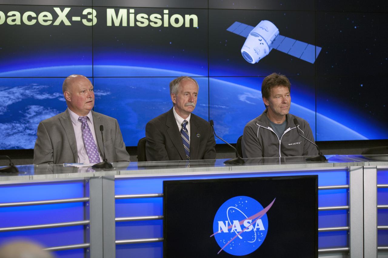 CAPE CANAVERAL, Fla. - Participating in a SpaceX-3 post-launch news conference in the NASA Press Site television auditorium at Kennedy Space Center in Florida are, from left, Michael Curie, NASA Public Affairs, William Gersteinmeier, NASA associate administrator for Human Exploration and Operations, and Hans Koenigsmann, SpaceX vice president of Mission Assurance. SpaceX CEO and chief designer Elon Musk participated in the conference by telephone.    SpaceX-3 launched at 3:25 p.m. EDT aboard a Falcon 9 rocket carrying a Dragon capsule from Space Launch Complex 40 on Cape Canaveral Air Force Station. Dragon is making its fourth trip to the space station. The SpaceX-3 mission, carrying almost 2.5 tons of supplies, technology and science experiments, is the third of 12 flights through a $1.6 billion NASA Commercial Resupply Services contract. Dragon's cargo will support more than 150 experiments that will be conducted during the station's Expeditions 39 and 40.  For more information, visit http://www.nasa.gov/mission_pages/station/structure/launch/index.html.  Photo credit: NASA/Kim Shiflett