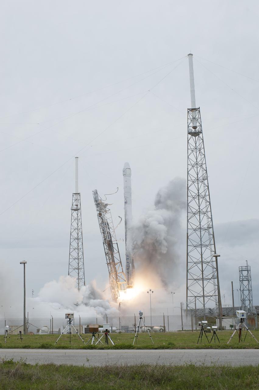 CAPE CANAVERAL, Fla. - An exhaust cloud builds around the Falcon 9 rocket at Space Launch Complex 40 on Cape Canaveral Air Force Station as the SpaceX-3 mission lifts off, starting the Dragon resupply spacecraft on its way to the International Space Station. Launch was during an instantaneous window at 3:25 p.m. EDT.      Dragon is making its fourth trip to the space station. The SpaceX-3 mission, carrying almost 2.5 tons of supplies, technology and science experiments, is the third of 12 flights through a $1.6 billion NASA Commercial Resupply Services contract. Dragon's cargo will support more than 150 experiments that will be conducted during the station's Expeditions 39 and 40.  For more information, visit http://www.nasa.gov/mission_pages/station/structure/launch/index.html.  Photo credit: NASA/Tony Gray and Tim Terry