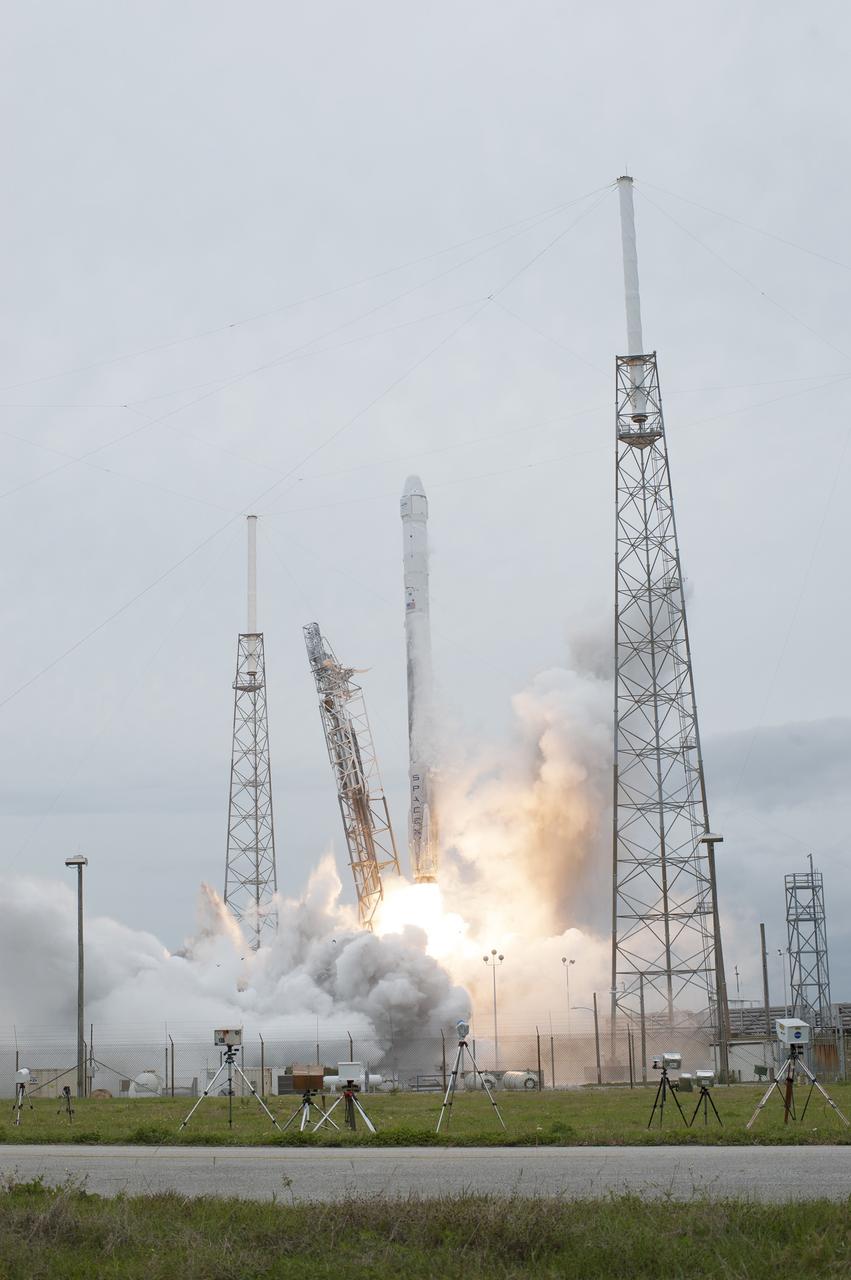 CAPE CANAVERAL, Fla. - An exhaust cloud grows around the Falcon 9 rocket at Space Launch Complex 40 on Cape Canaveral Air Force Station as the SpaceX-3 mission lifts off, sending the Dragon resupply spacecraft on its way to the International Space Station. Launch was during an instantaneous window at 3:25 p.m. EDT.      Dragon is making its fourth trip to the space station. The SpaceX-3 mission, carrying almost 2.5 tons of supplies, technology and science experiments, is the third of 12 flights through a $1.6 billion NASA Commercial Resupply Services contract. Dragon's cargo will support more than 150 experiments that will be conducted during the station's Expeditions 39 and 40.  For more information, visit http://www.nasa.gov/mission_pages/station/structure/launch/index.html.  Photo credit: NASA/Tony Gray and Tim Terry