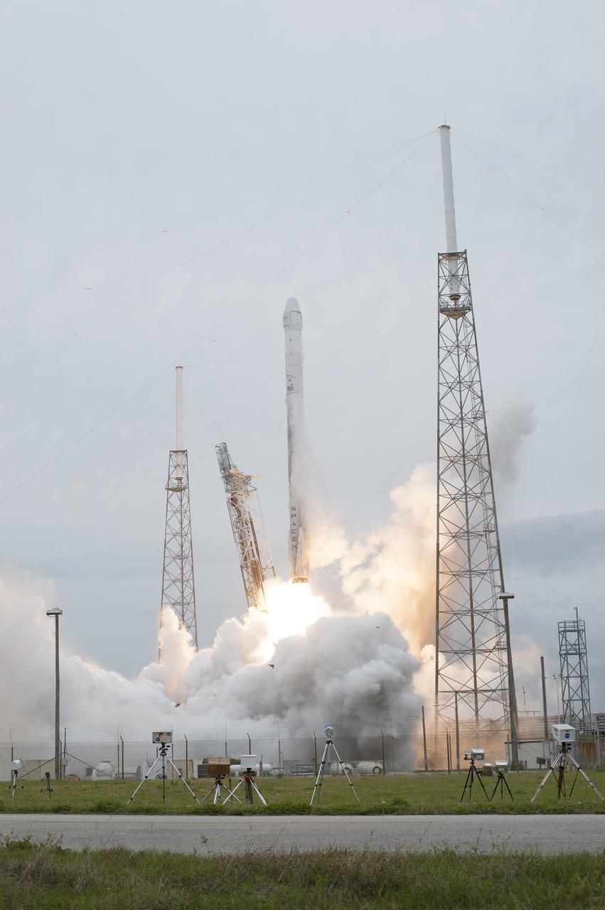 CAPE CANAVERAL, Fla. - An exhaust cloud and flash of light under the Falcon 9 rocket signals liftoff of the SpaceX-3 mission from Space Launch Complex 40 on Cape Canaveral Air Force Station, sending the Dragon resupply spacecraft on its way to the International Space Station. Launch was during an instantaneous window at 3:25 p.m. EDT.      Dragon is making its fourth trip to the space station. The SpaceX-3 mission, carrying almost 2.5 tons of supplies, technology and science experiments, is the third of 12 flights through a $1.6 billion NASA Commercial Resupply Services contract. Dragon's cargo will support more than 150 experiments that will be conducted during the station's Expeditions 39 and 40.  For more information, visit http://www.nasa.gov/mission_pages/station/structure/launch/index.html.  Photo credit: NASA/Tony Gray and Tim Terry