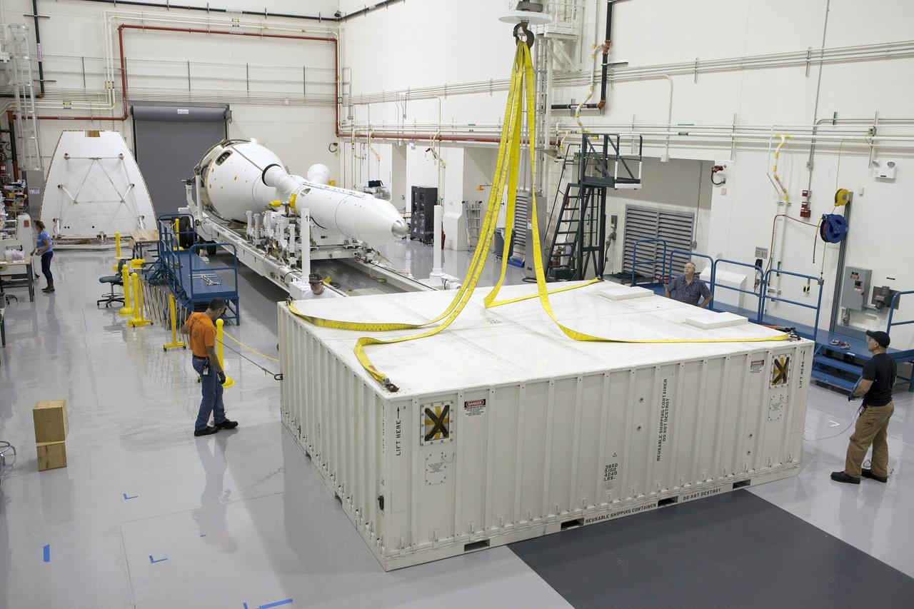 CAPE CANAVERAL, Fla. - The second set of two Ogive panels for the Orion Launch Abort System have arrived by truck at the Launch Abort System Facility, or LASF, at NASA’s Kennedy Space Center in Florida. The Ogive panels will be uncrated inside the LASF. During processing, the panels will be secured around the Orion crew module and attached to the Launch Abort System. Orion is the exploration spacecraft designed to carry astronauts to destinations not yet explored by humans, including an asteroid and Mars. It will have emergency abort capability, sustain the crew during space travel and provide safe re-entry from deep space return velocities. The first unpiloted test flight of Orion is scheduled to launch in 2014 atop a Delta IV rocket and in 2017 on NASA’s Space Launch System rocket. For more information, visit www.nasa.gov/orion. Photo credit: Kim Shiflett