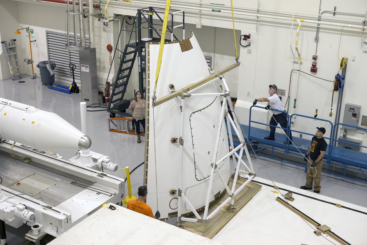 CAPE CANAVERAL, Fla. - The second set of two Ogive panels for the Orion Launch Abort System have arrived at the Launch Abort System Facility, or LASF, at NASA’s Kennedy Space Center in Florida. One of the Ogive panels has been uncrated and is being lifted by crane for placement on a work stand. During processing, the panels will be secured around the Orion crew module and attached to the Launch Abort System. Orion is the exploration spacecraft designed to carry astronauts to destinations not yet explored by humans, including an asteroid and Mars. It will have emergency abort capability, sustain the crew during space travel and provide safe re-entry from deep space return velocities. The first unpiloted test flight of Orion is scheduled to launch in 2014 atop a Delta IV rocket and in 2017 on NASA’s Space Launch System rocket. For more information, visit www.nasa.gov/orion. Photo credit: Kim Shiflett