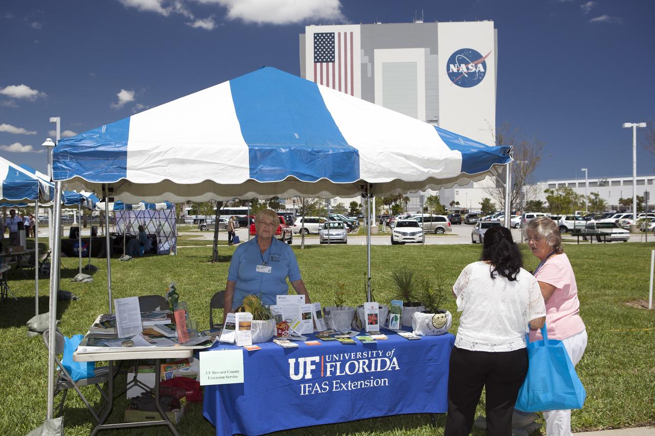 CAPE CANAVERAL, Fla. -- NASA's Kennedy Space Center in Florida hosts a Sustainability Fair in observance of Earth Day. The fair was held adjacent to the Pathfinder Fitness Trail across the street from the 525-foot-tall Vehicle Assembly Building in Launch Complex 39. Kennedy Earth Day events included booths by a dozen sustainable companies and environmental organizations, displays on organic gardening, recycling, sustainable materials, alternative fuels and wildlife, and test-drives of several alternative-fuel vehicles. In keeping with the national theme, "Green Cities," the fair provided employees with the opportunity to learn how to do their parts in securing a healthy and sustainable future for their cities and the planet. The space center's sustainability objective is to "promote, maintain and pioneer green practices in all aspects of our mission, striving to be an agency leader in everything we do." For more information on Kennedy's sustainability policy, visit http://www.nasa.gov/centers/kennedy/about/sustainability. Photo credit: NASA/Dimitri Gerondidakis