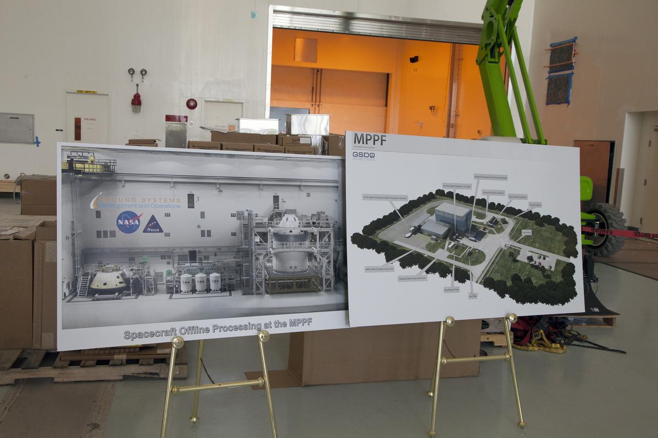 CAPE CANAVERAL, Fla. – Modifications continue on the Multi-Payload Processing Facility, or MPPF, at NASA's Kennedy Space Center in Florida. Artist illustrations on display inside the high bay show how the interior and exterior will look after the modifications and upgrades have been completed.    Kennedy's Center Operations Directorate is overseeing upgrades to the MPPF for the Ground Systems Development and Operations Program. The extensive upgrades and modernizations will support processing of Orion spacecraft for NASA's exploration missions. The 19,647-square-foot building, originally constructed in 1995, primarily will be used for Orion hypergolic fueling, ammonia servicing and high-pressure gas servicing and checkout before being transported to the Vehicle Assembly Building for integration with the Space Launch System. Photo credit: NASA/Daniel Casper