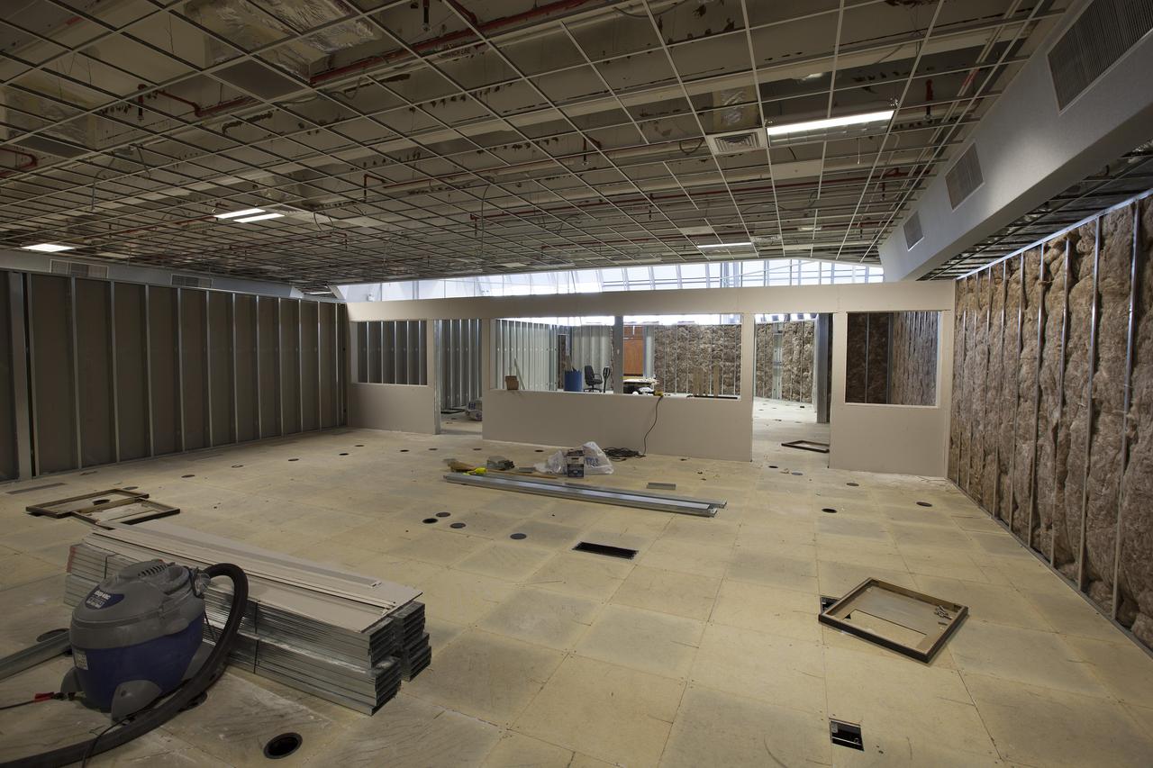 CAPE CANAVERAL, Fla. – Modifications to Firing Room 4 in the Launch Control Center at NASA's Kennedy Space Center in Florida continue to take shape. Construction workers have installed the framing and some of the insulation and inner walls. The Ground Systems Development and Operations Program is overseeing efforts to create a new firing room based on a multi-user concept.    The design of Firing Room 4 will incorporate five control room areas that are flexible to meet current and future NASA and commercial user requirements. The equipment and most of the consoles from Firing Room 4 were moved to Firing Room 2 for possible future reuse. Photo credit: NASA/Dimitri Gerondidakis