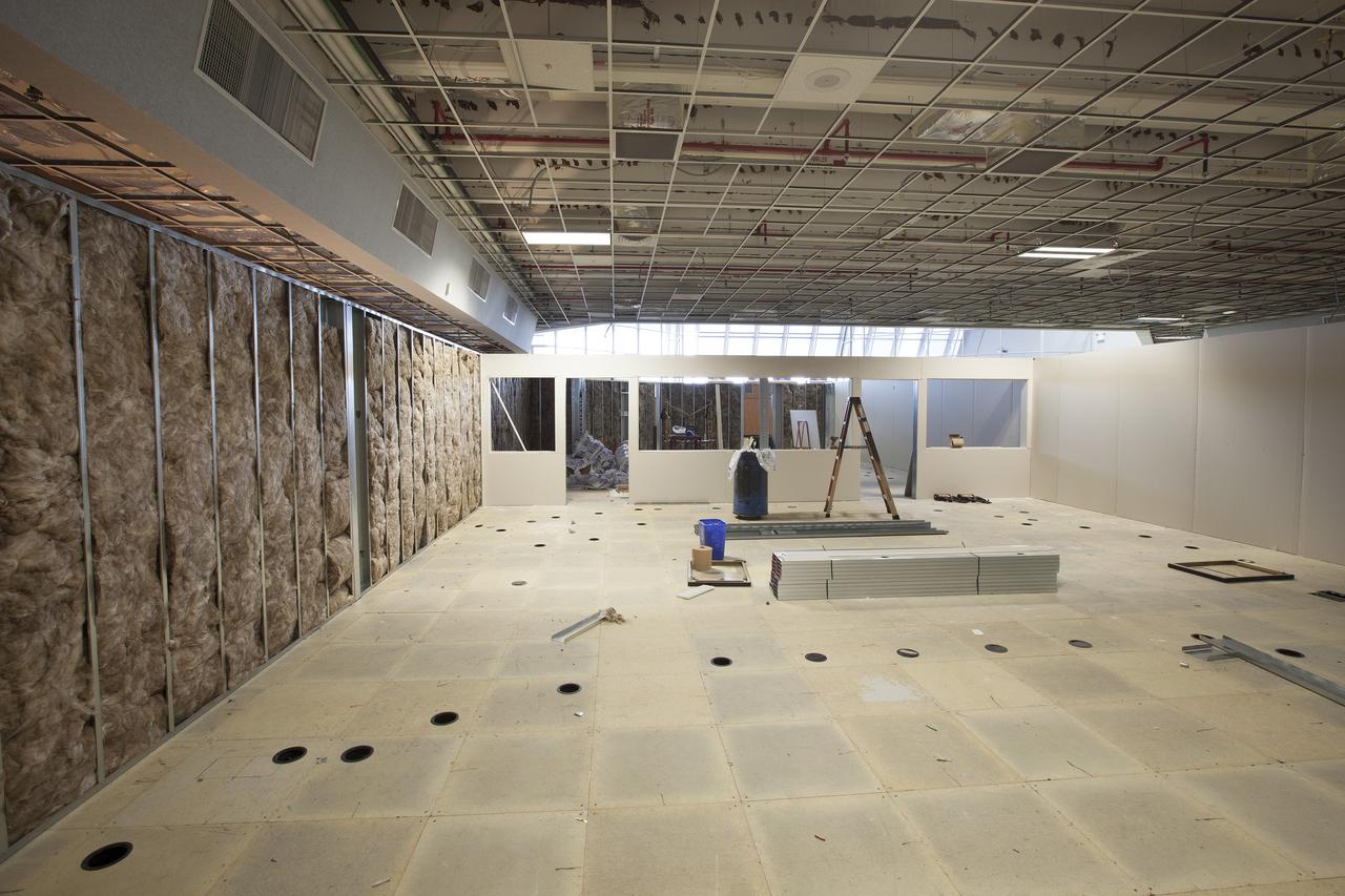 CAPE CANAVERAL, Fla. – Modifications to Firing Room 4 in the Launch Control Center at NASA's Kennedy Space Center in Florida continue to take shape. Construction workers have installed the framing and some of the insulation and inner walls. The Ground Systems Development and Operations Program is overseeing efforts to create a new firing room based on a multi-user concept.    The design of Firing Room 4 will incorporate five control room areas that are flexible to meet current and future NASA and commercial user requirements. The equipment and most of the consoles from Firing Room 4 were moved to Firing Room 2 for possible future reuse. Photo credit: NASA/Dimitri Gerondidakis