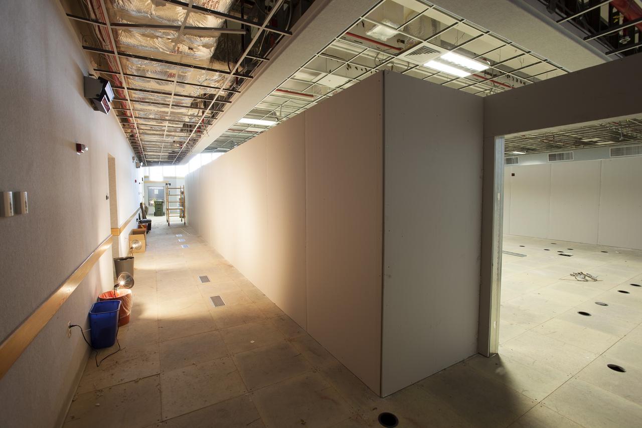 CAPE CANAVERAL, Fla. – Modifications to Firing Room 4 in the Launch Control Center at NASA's Kennedy Space Center in Florida continue to take shape. Construction workers have installed the framing and some of the inner walls. The Ground Systems Development and Operations Program is overseeing efforts to create a new firing room based on a multi-user concept.    The design of Firing Room 4 will incorporate five control room areas that are flexible to meet current and future NASA and commercial user requirements. The equipment and most of the consoles from Firing Room 4 were moved to Firing Room 2 for possible future reuse. Photo credit: NASA/Dimitri Gerondidakis