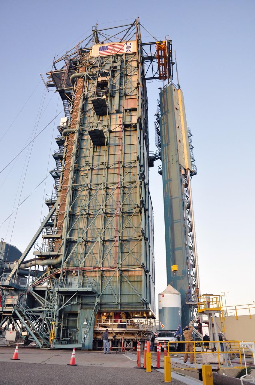 VANDENBERG AIR FORCE BASE, Calif. – Preparations are underway to lift the interstage adapter, or ISA, for NASA's Orbiting Carbon Observatory-2 mission, or OCO-2, into the mobile service tower at Space Launch Complex 2 on Vandenberg Air Force Base in California.    OCO-2 is scheduled to launch into a polar Earth orbit aboard a United Launch Alliance Delta II 7320-10C rocket in July. The ISA is the interface between the Delta II first and second stages. The second stage engine fits within the ISA. Once in orbit, OCO-2 will collect precise global measurements of carbon dioxide in the Earth's atmosphere and provide scientists with a better idea of the chemical compound's impacts on climate change. Scientists will analyze this data to improve our understanding of the natural processes and human activities that regulate the abundance and distribution of this important atmospheric gas. To learn more about OCO-2, visit http://oco.jpl.nasa.gov.  Photo credit: NASA/Randy Beaudoin