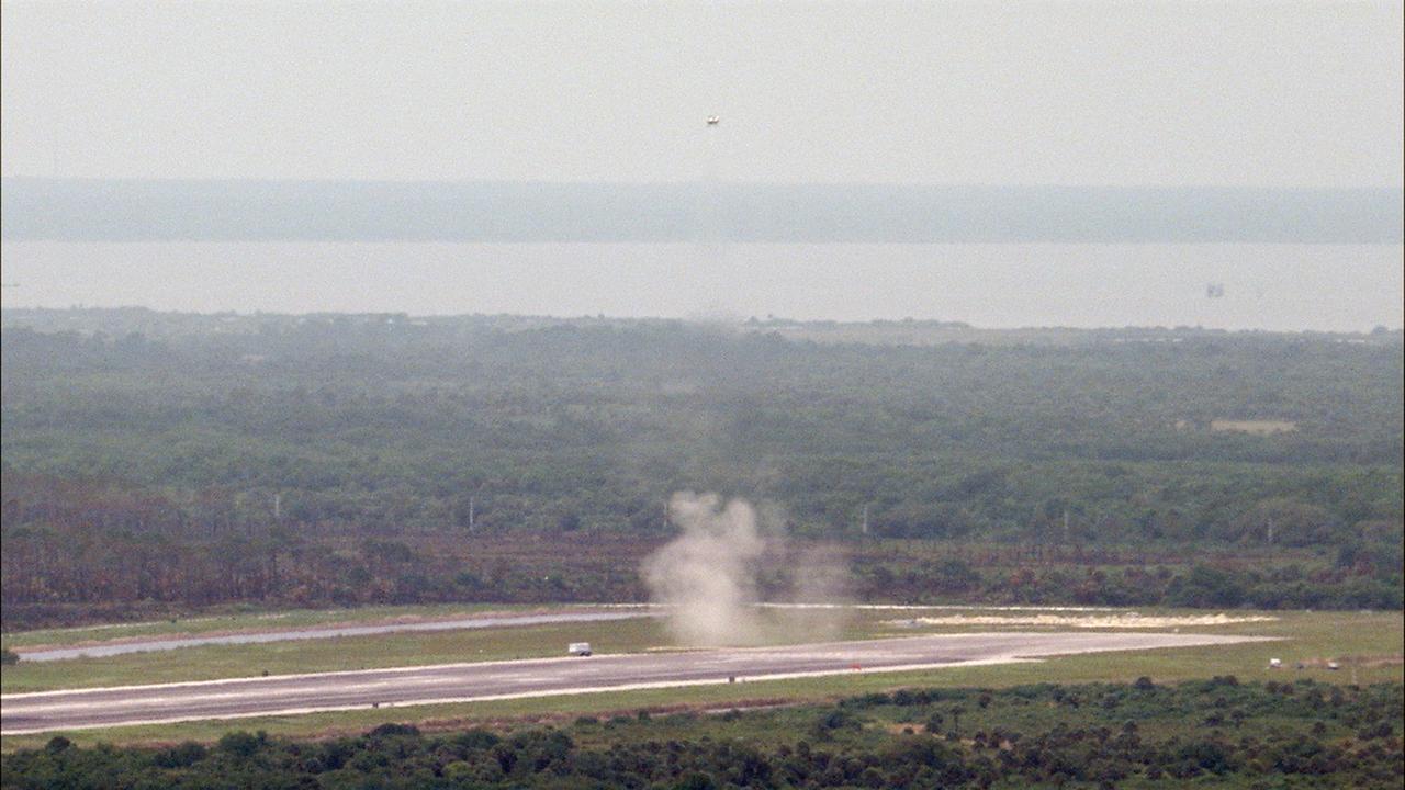 CAPE CANAVERAL, Fla. – NASA's Project Morpheus prototype lander soars high after lifting off on a free-flight test from a new launch pad at the north end of the Shuttle Landing Facility at NASA's Kennedy Space Center in Florida. The 98-second test began at 1:57 p.m. EDT with the Morpheus lander launching from the ground over a flame trench and ascending more than 800 feet at a peak speed of 36 mph. The vehicle, with its recently installed autonomous landing and hazard avoidance technology, or ALHAT, sensors surveyed the hazard field to determine safe landing sites. Morpheus then flew forward and downward covering approximately 1300 feet while performing a 78-foot divert to simulate a hazard avoidance maneuver. The lander descended and landed on a dedicated pad inside the ALHAT hazard field. Project Morpheus tests NASA’s ALHAT and an engine that runs on liquid oxygen and methane, which are green propellants. These new capabilities could be used in future efforts to deliver cargo to planetary surfaces.    The landing facility provides the lander with the kind of field necessary for realistic testing, complete with rocks, craters and hazards to avoid. Morpheus’ ALHAT payload allows it to navigate to clear landing sites amidst rocks, craters and other hazards during its descent. Project Morpheus is being managed under the Advanced Exploration Systems, or AES, Division in NASA’s Human Exploration and Operations Mission Directorate. The efforts in AES pioneer new approaches for rapidly developing prototype systems, demonstrating key capabilities and validating operational concepts for future human missions beyond Earth orbit. For more information on Project Morpheus, visit http://morpheuslander.jsc.nasa.gov/.  Photo credit: NASA/Frankie Martin