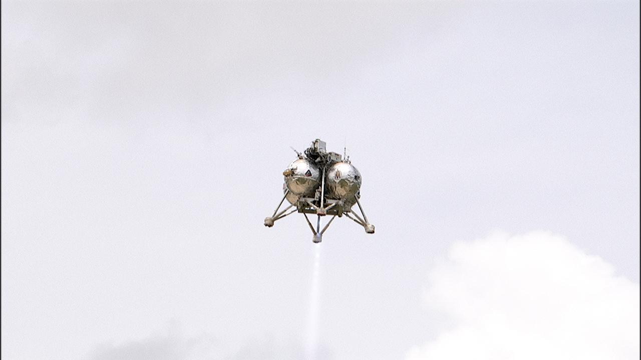 CAPE CANAVERAL, Fla. – NASA's Project Morpheus prototype lander soars high after lifting off on a free-flight test from a new launch pad at the north end of the Shuttle Landing Facility at NASA's Kennedy Space Center in Florida. The 98-second test began at 1:57 p.m. EDT with the Morpheus lander launching from the ground over a flame trench and ascending more than 800 feet at a peak speed of 36 mph. The vehicle, with its recently installed autonomous landing and hazard avoidance technology, or ALHAT, sensors surveyed the hazard field to determine safe landing sites. Morpheus then flew forward and downward covering approximately 1300 feet while performing a 78-foot divert to simulate a hazard avoidance maneuver. The lander descended and landed on a dedicated pad inside the ALHAT hazard field. Project Morpheus tests NASA’s ALHAT and an engine that runs on liquid oxygen and methane, which are green propellants. These new capabilities could be used in future efforts to deliver cargo to planetary surfaces.    The landing facility provides the lander with the kind of field necessary for realistic testing, complete with rocks, craters and hazards to avoid. Morpheus’ ALHAT payload allows it to navigate to clear landing sites amidst rocks, craters and other hazards during its descent. Project Morpheus is being managed under the Advanced Exploration Systems, or AES, Division in NASA’s Human Exploration and Operations Mission Directorate. The efforts in AES pioneer new approaches for rapidly developing prototype systems, demonstrating key capabilities and validating operational concepts for future human missions beyond Earth orbit. For more information on Project Morpheus, visit http://morpheuslander.jsc.nasa.gov/.  Photo credit: NASA/Frankie Martin