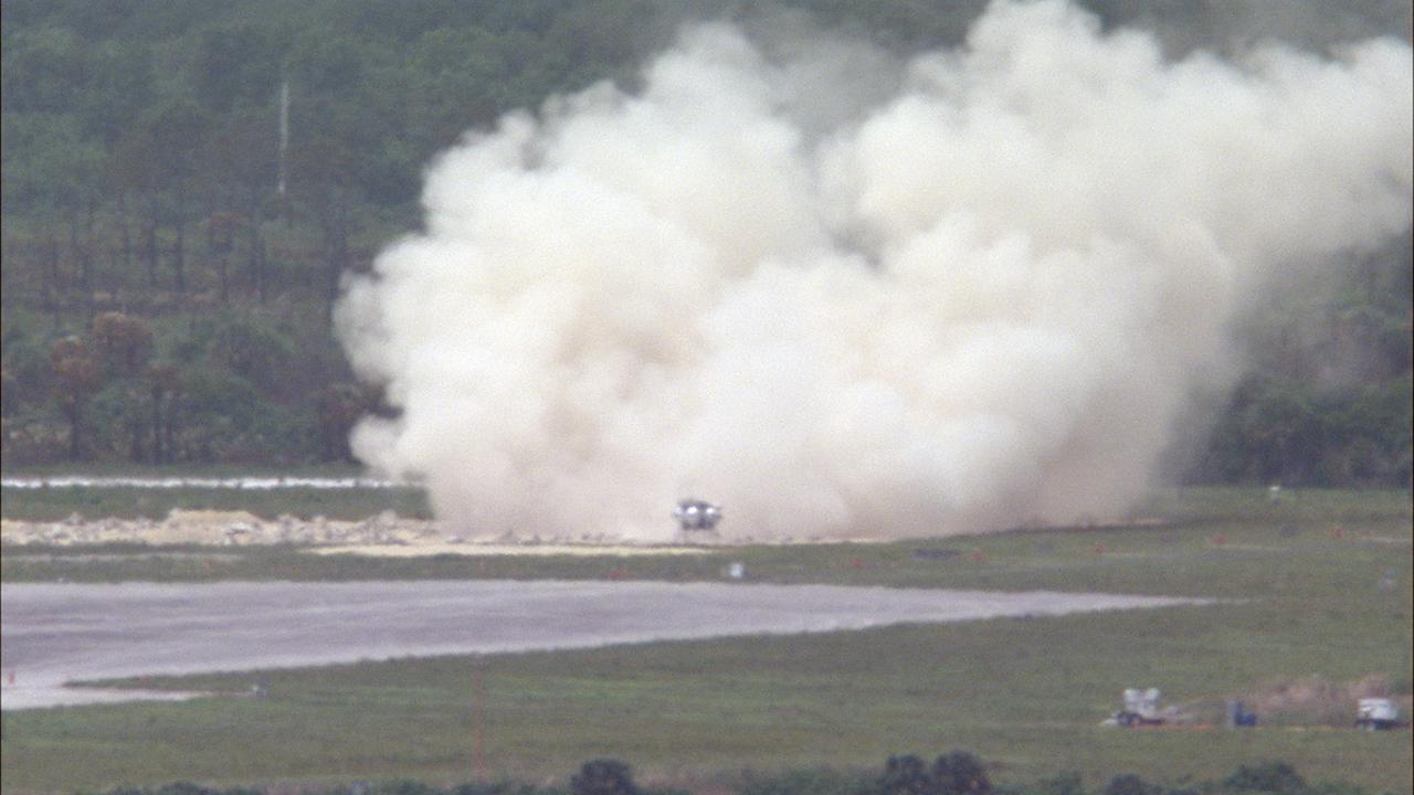 CAPE CANAVERAL, Fla. – NASA's Project Morpheus prototype lander touches down on the autonomous landing and hazard avoidance technology, or ALHAT, field after lifting off on a free-flight test from a new launch pad at the north end of the Shuttle Landing Facility at NASA's Kennedy Space Center in Florida. The 98-second test began at 1:57 p.m. EDT with the Morpheus lander launching from the ground over a flame trench and ascending more than 800 feet at a peak speed of 36 mph. The vehicle, with its recently installed ALHAT sensors, surveyed the hazard field to determine safe landing sites. Morpheus then flew forward and downward covering approximately 1300 feet while performing a 78-foot divert to simulate a hazard avoidance maneuver. The lander descended and landed on a dedicated pad inside the ALHAT hazard field. Project Morpheus tests NASA’s ALHAT and an engine that runs on liquid oxygen and methane, which are green propellants. These new capabilities could be used in future efforts to deliver cargo to planetary surfaces.    The landing facility provides the lander with the kind of field necessary for realistic testing, complete with rocks, craters and hazards to avoid. Morpheus’ ALHAT payload allows it to navigate to clear landing sites amidst rocks, craters and other hazards during its descent. Project Morpheus is being managed under the Advanced Exploration Systems, or AES, Division in NASA’s Human Exploration and Operations Mission Directorate. The efforts in AES pioneer new approaches for rapidly developing prototype systems, demonstrating key capabilities and validating operational concepts for future human missions beyond Earth orbit. For more information on Project Morpheus, visit http://morpheuslander.jsc.nasa.gov/.  Photo credit: NASA/Frankie Martin