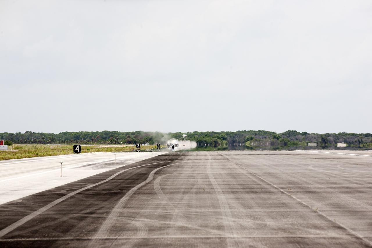 CAPE CANAVERAL, Fla. – NASA's Project Morpheus prototype lander lifts off on a free-flight test from a new launch pad at the north end of the Shuttle Landing Facility at NASA's Kennedy Space Center in Florida. The 98-second test began at 1:57 p.m. EDT with the Morpheus lander launching from the ground over a flame trench and ascending more than 800 feet at a peak speed of 36 mph. The vehicle, with its recently installed autonomous landing and hazard avoidance technology, or ALHAT, sensors surveyed the hazard field to determine safe landing sites. Morpheus then flew forward and downward covering approximately 1300 feet while performing a 78-foot divert to simulate a hazard avoidance maneuver. The lander descended and landed on a dedicated pad inside the ALHAT hazard field. Project Morpheus tests NASA’s ALHAT and an engine that runs on liquid oxygen and methane, which are green propellants. These new capabilities could be used in future efforts to deliver cargo to planetary surfaces. The landing facility provides the lander with the kind of field necessary for realistic testing, complete with rocks, craters and hazards to avoid. Morpheus’ ALHAT payload allows it to navigate to clear landing sites amidst rocks, craters and other hazards during its descent. Project Morpheus is being managed under the Advanced Exploration Systems, or AES, Division in NASA’s Human Exploration and Operations Mission Directorate. The efforts in AES pioneer new approaches for rapidly developing prototype systems, demonstrating key capabilities and validating operational concepts for future human missions beyond Earth orbit. For more information on Project Morpheus, visit http://morpheuslander.jsc.nasa.gov/. Photo credit: NASA/Kim Shiflett