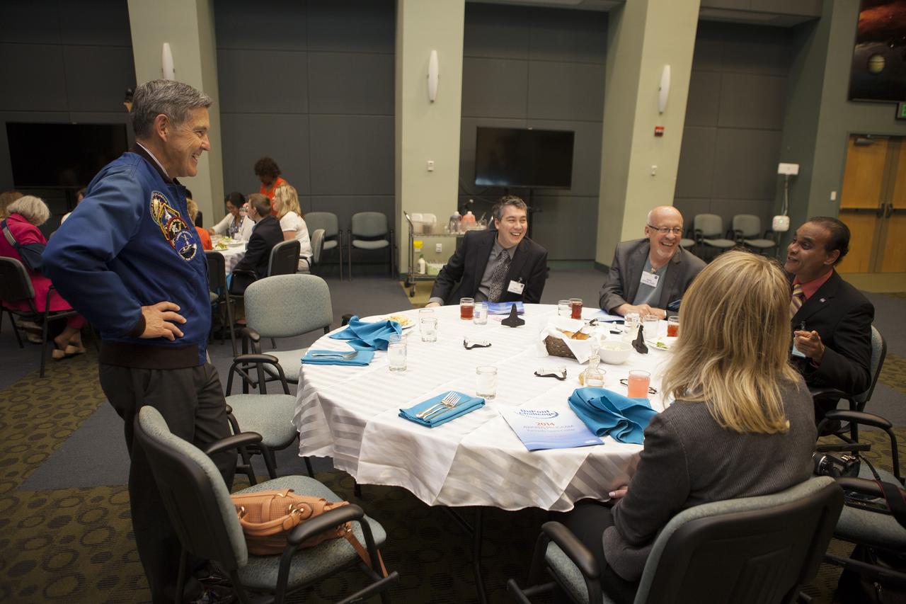 CAPE CANAVERAL, Fla. – At the Kennedy Space Center Visitor Complex in Florida, Bob Cabana, the center's director, addresses teachers and VIPs during the 2014 DuPont Challenge Science Essay Competition awards ceremony at the Operations and Support Building II. The challenge, now in its 28th year, reaches out to students from grades seven through 12 from all 50 states and Canada. More than 200,000 students entered the competition. The DuPont Challenge aims to inspire students to excel and achieve in scientific writing and pursue careers in science, technology, engineering and mathematics STEM. The challenge honors space shuttle Challenger's STS-51L crew members who gave their lives while furthering the cause of exploration and discovery. For more information on the challenge, go to http://thechallenge.dupont.com/sponsors/nasa.php.  Photo credit: NASA/Kim Shiflett