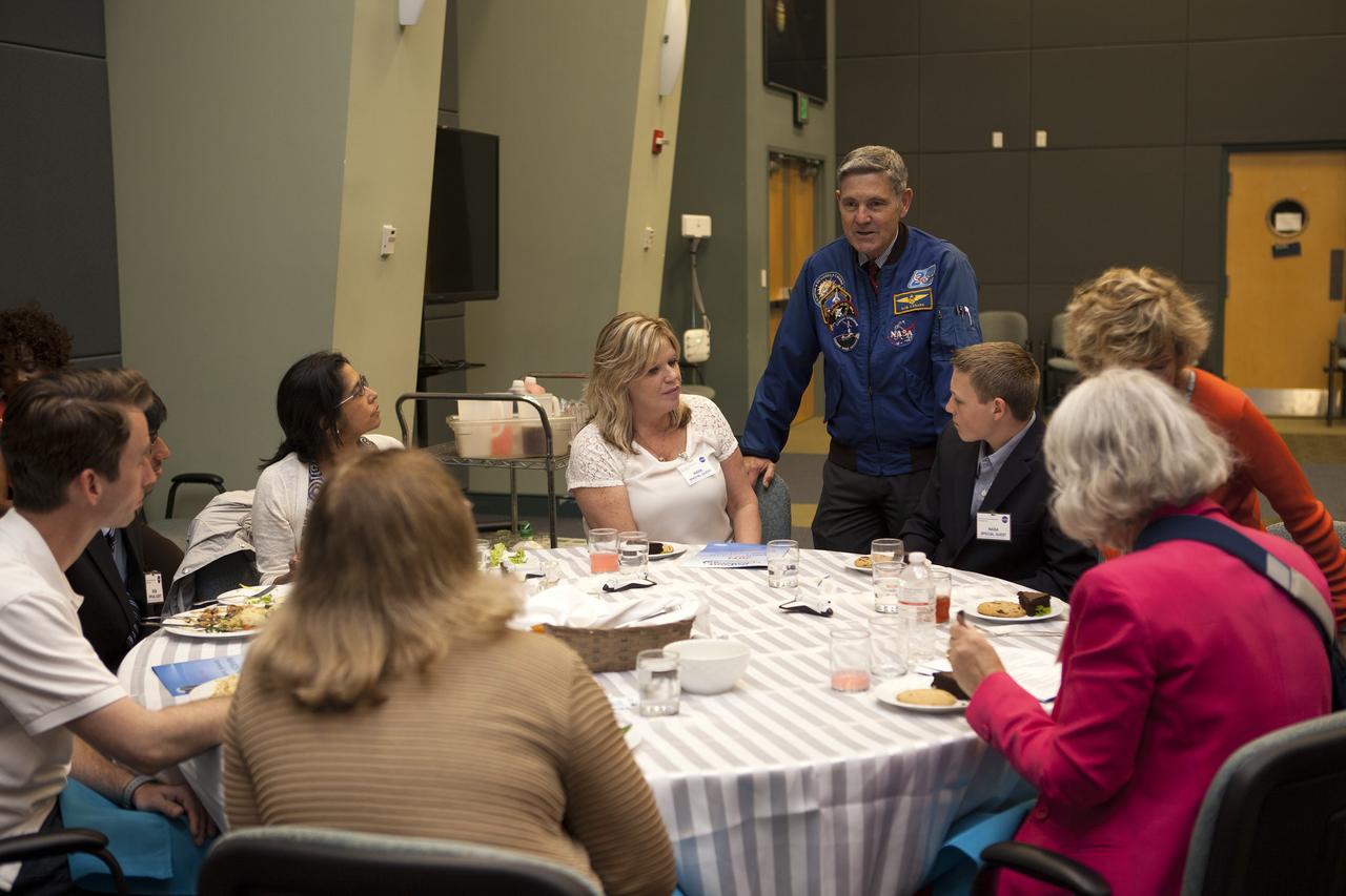 CAPE CANAVERAL, Fla. – At the Kennedy Space Center Visitor Complex in Florida, Bob Cabana, the center's director, addresses parents, teachers and VIPs during the 2014 DuPont Challenge Science Essay Competition awards ceremony at the Operations and Support Building II. The challenge, now in its 28th year, reaches out to students from grades seven through 12 from all 50 states and Canada. More than 200,000 students entered the competition. The DuPont Challenge aims to inspire students to excel and achieve in scientific writing and pursue careers in science, technology, engineering and mathematics STEM. The challenge honors space shuttle Challenger's STS-51L crew members who gave their lives while furthering the cause of exploration and discovery. For more information on the challenge, go to http://thechallenge.dupont.com/sponsors/nasa.php. Photo credit: NASA/Kim Shiflett