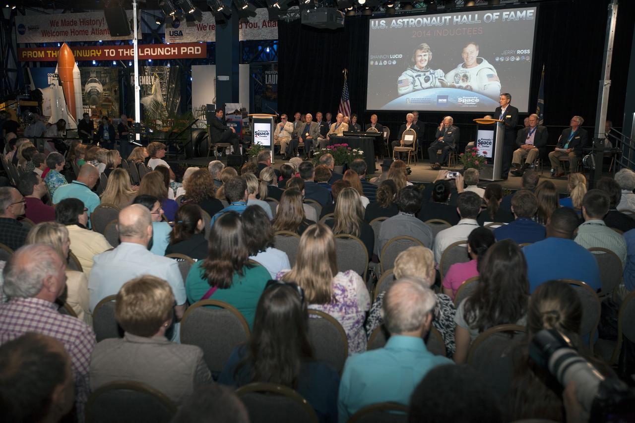 CAPE CANAVERAL, Fla. – Inside the Space Shuttle Atlantis attraction at NASA’s Kennedy Space Center Visitor Complex in Florida, Kennedy Space Center Director and Hall of Famer Robert Cabana speaks during the U.S. Astronaut Hall of Fame Induction ceremony. Space shuttle astronauts and space explorers Shannon Lucid and Jerry Ross were inducted into the Hall of Fame Class of 2014. The 2014 inductees are selected by a committee of Hall of Fame astronauts, former NASA officials, flight directors, historians and journalists. The process is administered by the Astronaut Scholarship Foundation. To be eligible, an astronaut must have made his or her first flight at least 17 years before the induction. Candidates must be a U.S. citizen and a NASA-trained commander, pilot or mission specialist who has orbited the earth at least once. Including Lucid and Ross, 87 astronauts have been inducted into the AHOF. Photo credit: NASA/Kim Shiflett