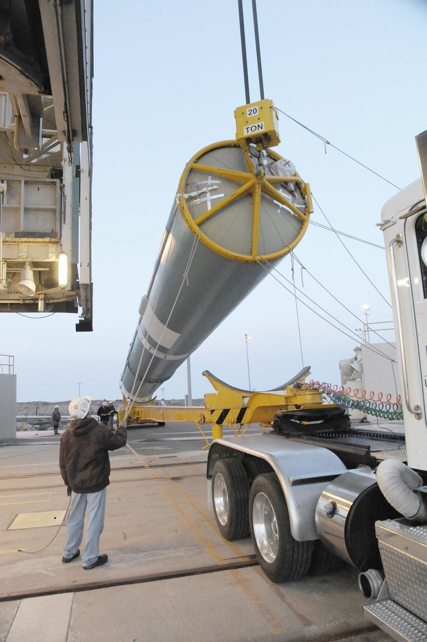 VANDENBERG AIR FORCE BASE, Calif. – The United Launch Alliance Delta II rocket for NASA's Orbiting Carbon Observatory-2 mission, or OCO-2, is lifted into a vertical position beside the mobile service tower at Space Launch Complex 2 on Vandenberg Air Force Base in California.    Launch is scheduled for July 1, 2014.  The observatory will collect precise global measurements of carbon dioxide in the Earth's atmosphere and provide scientists with a better idea of the chemical compound's impacts on climate change. Scientists will analyze this data to improve our understanding of the natural processes and human activities that regulate the abundance and distribution of this important atmospheric gas. To learn more about OCO-2, visit http://oco.jpl.nasa.gov.  Photo credit: NASA/Mark Mackley, 30th Space Wing