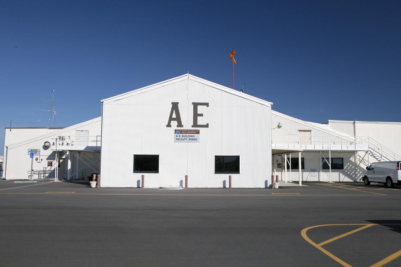 CAPE CANAVERAL, Fla. – Hangar AE on Cape Canav¬eral Air Force Station in Florida is used by NASA’s Launch Services Program as its communications center. The facility contains the program's Mission Director's Center, Launch Vehicle Data Center, and Telemetry Lab. The hangar, originally built in 1958 for a Department of De¬fense missile program, was acquired by NASA in 1960 and modified to support unmanned missions. To learn more about Hangar AE, visit http://www.nasa.gov/sites/default/files/files/Hangar-AE.pdf.  For more about Kennedy Space Center, visit http://www.nasa.gov/kennedy. Photo credit: NASA/Daniel Casper