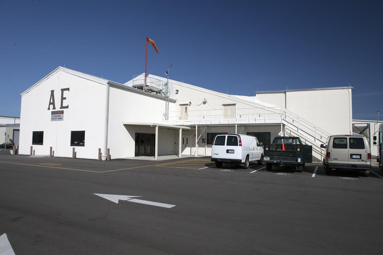 CAPE CANAVERAL, Fla. – Hangar AE on Cape Canav¬eral Air Force Station in Florida is used by NASA’s Launch Services Program as its communications center. The facility contains the program's Mission Director's Center, Launch Vehicle Data Center, and Telemetry Lab. The hangar, originally built in 1958 for a Department of De¬fense missile program, was acquired by NASA in 1960 and modified to support unmanned missions. To learn more about Hangar AE, visit http://www.nasa.gov/sites/default/files/files/Hangar-AE.pdf.  For more about Kennedy Space Center, visit http://www.nasa.gov/kennedy. Photo credit: NASA/Daniel Casper