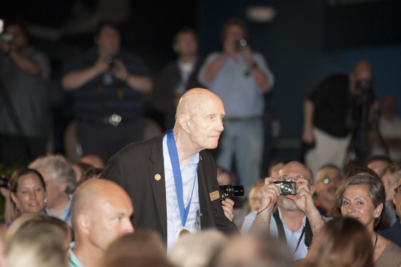 CAPE CANAVERAL, Fla. --Inside the Space Shuttle Atlantis attraction at NASA’s Kennedy Space Center Visitor Complex in Florida, former NASA astronaut and Hall of Famer General Tom Stafford walks the red carpet at the 2014 U.S. Astronaut Hall of Fame Induction ceremony. Space shuttle astronauts and space explorers Shannon Lucid and Jerry Ross were inducted into the Hall of Fame Class of 2014.    The 2014 inductees are selected by a committee of Hall of Fame astronauts, former NASA officials, flight directors, historians and journalists. The process is administered by the Astronaut Scholarship Foundation. To be eligible, an astronaut must have made his or her first flight at least 17 years before the induction. Candidates must be a U.S. citizen and a NASA-trained commander, pilot or mission specialist who has orbited the earth at least once. Including Lucid and Ross, 87 astronauts have been inducted into the AHOF.  Photo credit: NASA/Kim Shiflett