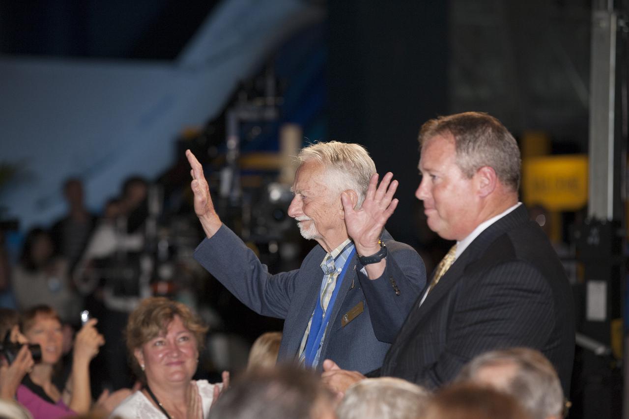 CAPE CANAVERAL, Fla. -- Inside the Space Shuttle Atlantis attraction at NASA’s Kennedy Space Center Visitor Complex in Florida, former NASA astronaut and Hall of Famer Owen Garriott walks the red carpet at the 2014 U.S. Astronaut Hall of Fame Induction ceremony. Space shuttle astronauts and space explorers Shannon Lucid and Jerry Ross were inducted into the Hall of Fame Class of 2014. The 2014 inductees are selected by a committee of Hall of Fame astronauts, former NASA officials, flight directors, historians and journalists. The process is administered by the Astronaut Scholarship Foundation. To be eligible, an astronaut must have made his or her first flight at least 17 years before the induction. Candidates must be a U.S. citizen and a NASA-trained commander, pilot or mission specialist who has orbited the earth at least once. Including Lucid and Ross, 87 astronauts have been inducted into the AHOF. Photo credit: NASA/Kim Shiflett