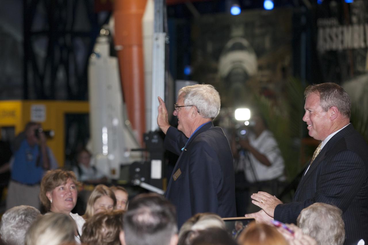 CAPE CANAVERAL, Fla. -- Inside the Space Shuttle Atlantis attraction at NASA’s Kennedy Space Center Visitor Complex in Florida, former NASA astronaut and Hall of Famer Dan Brandenstein walks the red carpet at the 2014 U.S. Astronaut Hall of Fame Induction ceremony. Space shuttle astronauts and space explorers Shannon Lucid and Jerry Ross were inducted into the Hall of Fame Class of 2014.    The 2014 inductees are selected by a committee of Hall of Fame astronauts, former NASA officials, flight directors, historians and journalists. The process is administered by the Astronaut Scholarship Foundation. To be eligible, an astronaut must have made his or her first flight at least 17 years before the induction. Candidates must be a U.S. citizen and a NASA-trained commander, pilot or mission specialist who has orbited the earth at least once. Including Lucid and Ross, 87 astronauts have been inducted into the AHOF.  Photo credit: NASA/Kim Shiflett
