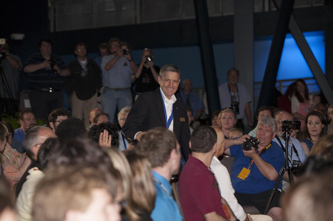 CAPE CANAVERAL, Fla. -- Inside the Space Shuttle Atlantis attraction at NASA’s Kennedy Space Center Visitor Complex in Florida, former NASA astronaut, Hall of Famer and Kennedy Center Director Bob Cabana  walks the red carpet at the 2014 U.S. Astronaut Hall of Fame Induction ceremony. Space shuttle astronauts and space explorers Shannon Lucid and Jerry Ross were inducted into the Hall of Fame Class of 2014.    The 2014 inductees are selected by a committee of Hall of Fame astronauts, former NASA officials, flight directors, historians and journalists. The process is administered by the Astronaut Scholarship Foundation. To be eligible, an astronaut must have made his or her first flight at least 17 years before the induction. Candidates must be a U.S. citizen and a NASA-trained commander, pilot or mission specialist who has orbited the earth at least once. Including Lucid and Ross, 87 astronauts have been inducted into the AHOF.  Photo credit: NASA/Kim Shiflett