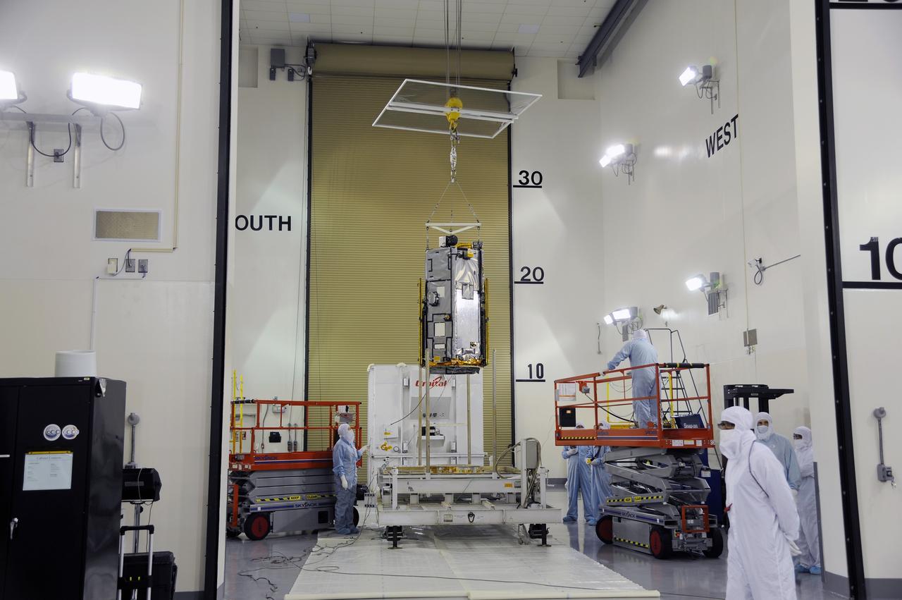 VANDENBERG AIR FORCE BASE, Calif. – In the Astrotech payload processing facility on Vandenberg Air Force Base in California, NASA's Orbiting Carbon Observatory-2, or OCO-2, is lifted from its transportation trailer. Testing and launch preparations now will get underway for its launch from Space Launch Complex 2 aboard a United Launch Alliance Delta II rocket, scheduled for July 1, 2014. The observatory will collect precise global measurements of carbon dioxide in the Earth's atmosphere and provide scientists with a better idea of the chemical compound's impacts on climate change. Scientists will analyze this data to improve our understanding of the natural processes and human activities that regulate the abundance and distribution of this important atmospheric gas. OCO-2 is a NASA Earth System Science Pathfinder Program mission managed by NASA's Jet Propulsion Laboratory JPL in Pasadena, California, for NASA's Science Mission Directorate in Washington. Orbital Sciences built the spacecraft and provides mission operations under JPL’s leadership. To learn more about OCO-2, visit http://oco.jpl.nasa.gov. Photo credit: NASA/Doug Gruben, 30th Space Wing