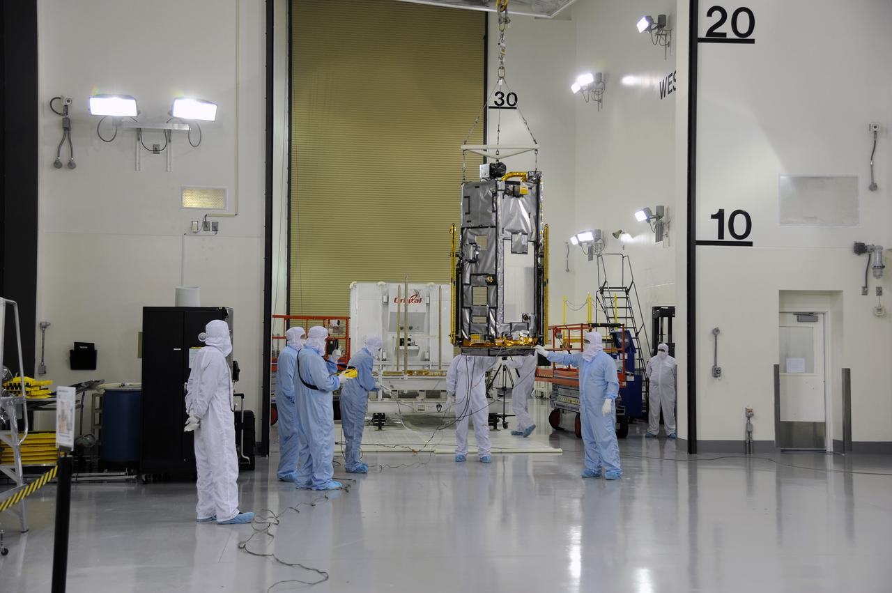 VANDENBERG AIR FORCE BASE, Calif. – In the Astrotech payload processing facility on Vandenberg Air Force Base in California, NASA's Orbiting Carbon Observatory-2, or OCO-2, glides across the room from its transportation trailer toward a test fixture. Testing and launch preparations now will get underway for its launch from Space Launch Complex 2 aboard a United Launch Alliance Delta II rocket, scheduled for July 1, 2014. The observatory will collect precise global measurements of carbon dioxide in the Earth's atmosphere and provide scientists with a better idea of the chemical compound's impacts on climate change. Scientists will analyze this data to improve our understanding of the natural processes and human activities that regulate the abundance and distribution of this important atmospheric gas. OCO-2 is a NASA Earth System Science Pathfinder Program mission managed by NASA's Jet Propulsion Laboratory JPL in Pasadena, California, for NASA's Science Mission Directorate in Washington. Orbital Sciences built the spacecraft and provides mission operations under JPL’s leadership. To learn more about OCO-2, visit http://oco.jpl.nasa.gov. Photo credit: NASA/Doug Gruben, 30th Space Wing
