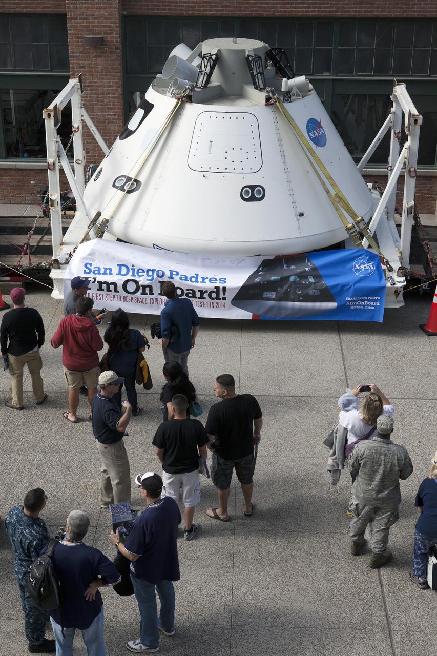 CAPE CANAVERAL, Fla. – The Orion boilerplate test vehicle is on display at Petco Park in San Diego, California, before the San Diego Padres' baseball game. The boilerplate test vehicle is being prepared for an Exploration Flight Test-1, or EFT-1, pre-transportation test. The Ground Systems Development and Operations Program will run the test at the U.S. Naval Base San Diego to simulate retrieval and transportation procedures for Orion after it splashes down in the ocean and is retrieved for return to land and ground transportation back to Kennedy Space Center in Florida.    Orion is the exploration spacecraft designed to carry astronauts to destinations not yet explored by humans, including an asteroid and Mars. It will have emergency abort capability, sustain the crew during space travel and provide safe re-entry from deep space return velocities. The first unpiloted test flight of the Orion is scheduled to launch later this year atop a Delta IV rocket and in 2017 on NASA’s Space Launch System rocket. For more information, visit http://www.nasa.gov/orion. Photo credit: NASA/Kim Shiflett