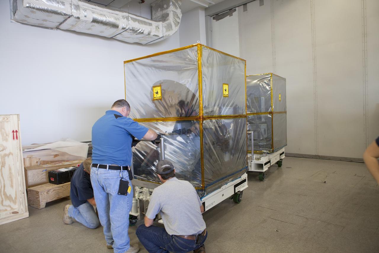 CAPE CANAVERAL, Fla. – The components of NASA's International Space Station-RapidScat scatterometer instrument arrive at the Space Station Processing Facility at Kennedy Space Center in Florida. ISS-RapidScat is the first scientific Earth-observing instrument designed to operate from the exterior of the space station. It will measure Earth's ocean surface wind speed and direction, providing data to be used in weather and marine forecasting. Built at NASA's Jet Propulsion Laboratory, ISS-RapidScat is slated to fly on the SpaceX-4 commercial cargo resupply flight in 2014. For more information, visit http://www.jpl.nasa.gov/missions/iss-rapidscat. Photo credit: NASA/Dimitri Gerondidakis